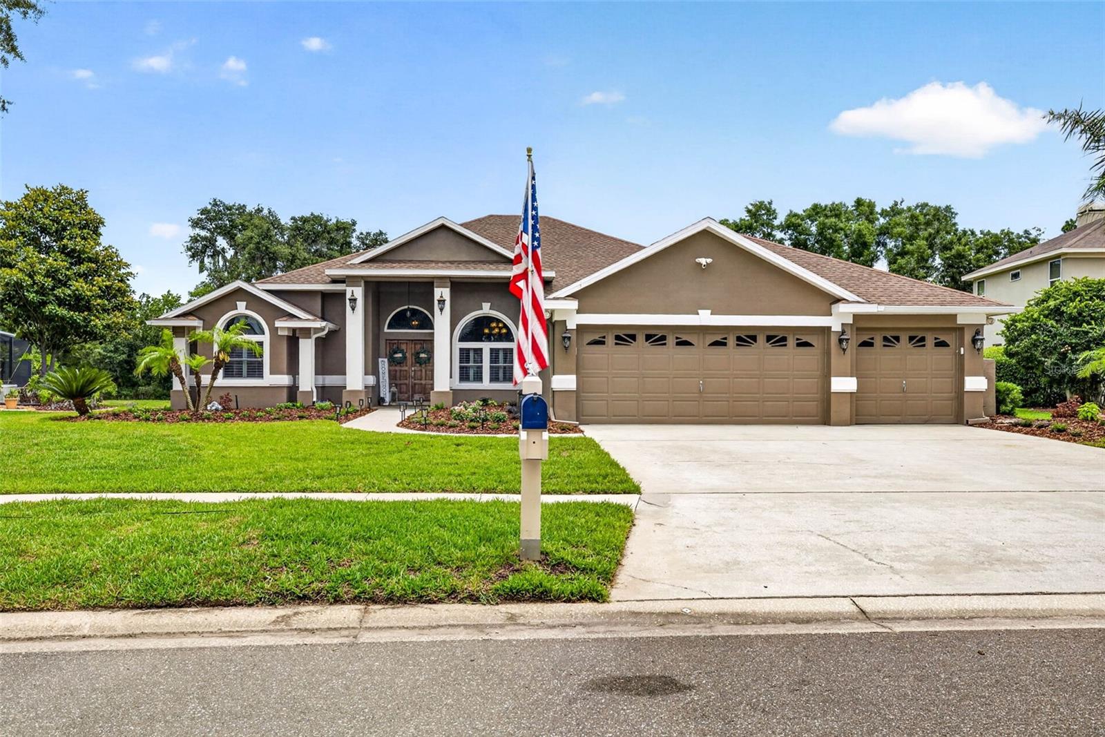 Beautifully renovated 4-bedroom, 3-bathroom home nestled in the gated golf course community of River Hills. This stunning residence is in the village of Players Club.  It has been completely updated from top to bottom, showcasing a modern kitchen with high-end finishes including a unique furniture style island and granite countertops, designer bathrooms, wood-look tile throughout with zero need for thresholds, did I mention one of the secondary bedrooms has a connected en-suite bathroom and walk in closet…a sparkling, heated, saltwater pool, and a luxurious outdoor kitchen tucked underneath the oversized covered lanai measuring 33’ x 17’—perfect for entertaining or relaxing in your private, fully fenced backyard oasis. Situated on a spacious 1/3-acre lot, the home backs up to serene conservation land teeming with wildlife, including frequent deer sightings, offering peaceful, private views and a true connection to nature. There are too many updates to list but here are some of the big-ticket items: Roof 2016, Panoramic Screen Enclosure 2022, All Windows and Sliders 2018, Saltwater Heated Pool renovation 2017.
This move-in-ready home combines luxury, location, and lifestyle in one of the most sought-after neighborhoods in the area. LIVING in River Hills Golf and Country Club Community provides “A” rated schools with easy access to the local elementary school and beyond on a golf cart if desired.  The community boasts miles of sidewalks, 4 miles of scenic nature trails along the Alafia River, and two secure gated entrances for privacy and convenience.  The community buzzes with social activities, including concerts in the park, holiday parades and festivities while fostering a strong sense of camaraderie and community spirit. Stay active with a brand-new fitness center, swim in the pool and savor live music and delicious meals at the on-site restaurant. Memberships are available for golf, tennis, and pickleball, catering to sports enthusiasts of all levels. This is more than a place to live—it's a lifestyle of connection, recreation, and natural beauty.
Just a short drive away, the pristine Gulf beaches invite you to enjoy sun-soaked shores and tranquil waters. MacDill Air Force Base is conveniently close, ideal for military personnel or visitors.  The vibrant Tampa Riverwalk and bustling downtown Tampa are nearby, offering dining, entertainment, and cultural attractions. Easy commute access to I4, I75, and Crosstown Expressway. This location perfectly balances coastal relaxation, theme park thrills, military convenience, and city energy, making it an ideal home base for every lifestyle.