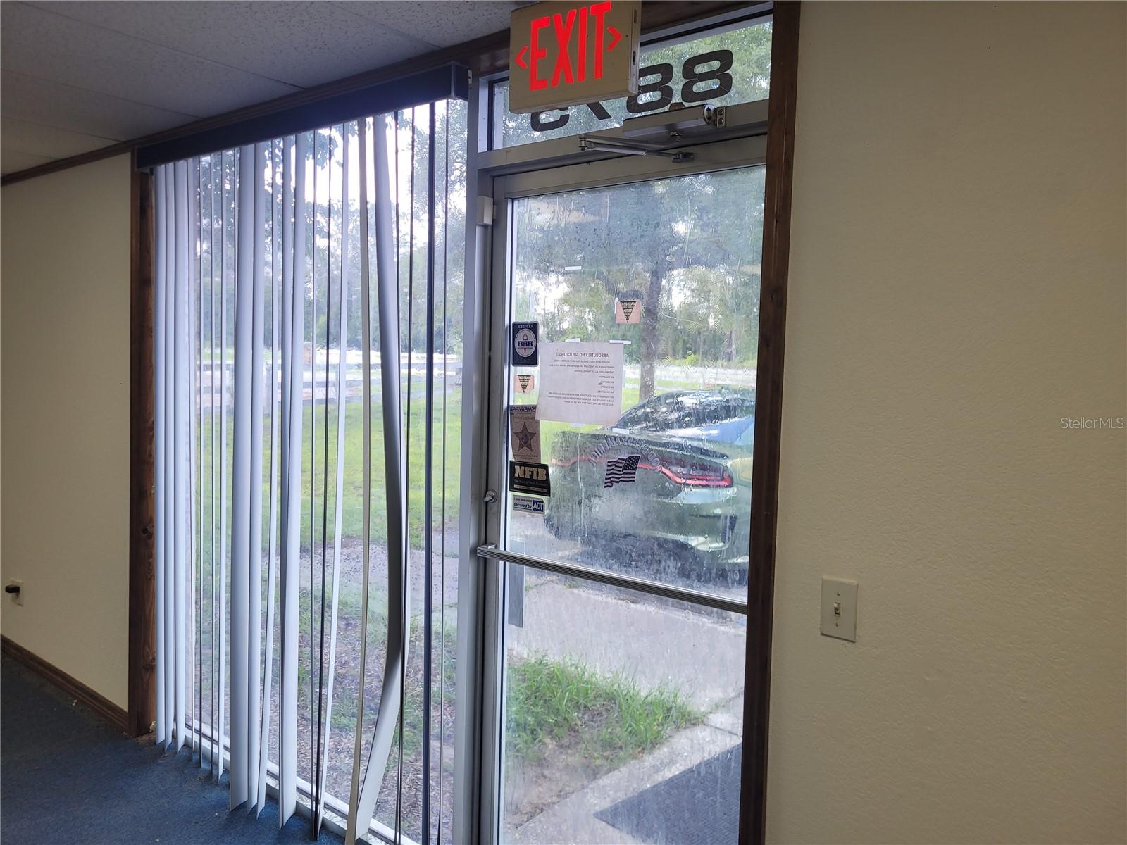 Prime commercial opportunity on high-visibility CR 25! This 4,800 SF building is zoned B-2 (General Business) and offers a versatile layout perfect for owner-users or investors. Front of building features a showroom/office area, private office, and break room, plus men's and women's restrooms. Over 3,700 SF of warehouse space in the rear with roll-up door access and a separate warehouse entrance for efficient operations. 200 amp electrical service. Front parking lot with main public entrance. Excellent road frontage on CR 25 provides outstanding visibility and drive-by traffic. Centrally located with convenient access to The Villages, Ocala, Belleview, Summerfield, and Ocklawaha. Ideal for retail, office, showroom, warehouse/distribution, or a wide range of B-2 permitted uses. Don't miss this rare combination of office presence and warehouse functionality in a growing corridor.