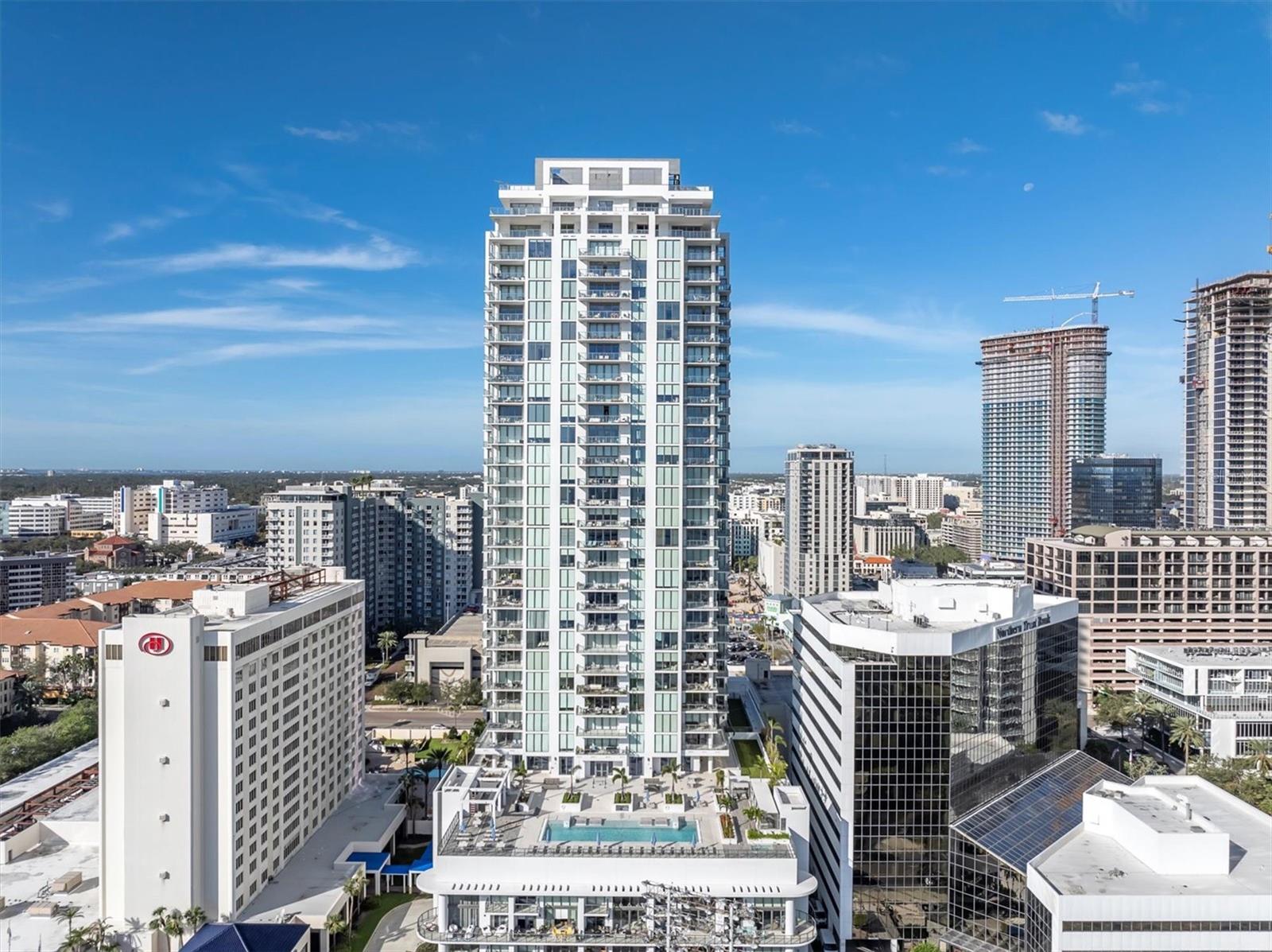 Welcome to Saltaire! Prized for its unparalleled location and breathtaking views, this 03 unit offers a rare opportunity to own a piece of luxury in one of the city’s most desirable buildings.

Unrivaled Views and Location

From your private terrace, soak in uninterrupted panoramic views of Tampa Bay, Albert Whitted Airport, Al Lang Stadium, the St. Petersburg Yacht Club & Marina, the St. Pete Pier, and the legendary Vinoy Hotel. North-facing and perfectly positioned, this residence delivers the most sought-after vantage point for enjoying both the vibrant energy of the city and serene waterfront beauty.

Sophisticated Design and Layout

This thoughtfully designed condo features an expansive open floor plan with sleek, contemporary finishes and custom details throughout. Floor-to-ceiling windows flood the living and dining areas with natural light, creating an airy and inviting ambiance while offering mesmerizing views of the city skyline, stadium, and waterfront.

The gourmet kitchen is a chef’s dream, complete with top-of-the-line appliances, spacious cabinetry, center island, and premium countertops. A stylish dry bar with refrigerated wine storage adds a touch of luxury, ideal for hosting guests or enjoying a quiet evening in.

Luxurious Living Spaces

This residence offers three generously sized en-suite bedrooms, a versatile den, and a convenient full bath, all designed with privacy and comfort in mind. The thoughtful floor plan ensures excellent separation between the primary suite and the secondary bedrooms, making it perfect for family living or hosting guests.

• Primary Suite: A tranquil retreat featuring sweeping views of Al Lang Stadium, a custom walk-in closet, and a spa-inspired en-suite bath. Enjoy dual vanities, a soaking tub, a walk-in shower, and elegant, high-end finishes.

• Secondary Bedrooms: Each spacious guest suite includes its own en-suite bathroom and ample closet space, with the same attention to detail and luxurious finishes found throughout the home.

Private Terrace – Your Front-Row Seat

Step onto your expansive private terrace to experience the electrifying atmosphere of Rowdies games, citywide events, and stunning sunrises. Whether you’re hosting friends for fireworks on game day or enjoying the peaceful energy of downtown St. Pete, this outdoor space is perfect for relaxation or entertaining.

World-Class Amenities

As a resident of Saltaire, you’ll enjoy access to an array of exclusive amenities, including:

• A resort-style pool with a spacious sun deck.

• A state-of-the-art fitness center.

• Concierge services for ultimate convenience.

• Secure parking and controlled building access with 24-hour security.

Prime Downtown Living

Situated in the heart of downtown St. Petersburg, Saltaire offers unmatched proximity to the city’s finest dining, entertainment, and cultural destinations. This residence seamlessly blends luxury living, modern convenience, and a dynamic urban lifestyle.

Don’t Miss Out!

This exceptional property offers a once-in-a-lifetime opportunity to live in the heart of downtown St. Pete, overlooking some of the city’s most iconic landmarks. Make Saltaire Unit 2203 your new home and experience the pinnacle of contemporary elegance and waterfront living.