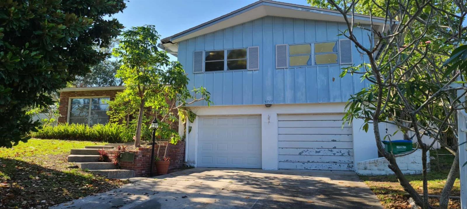 Rare Opportunity – Two Homes on One Property in a Prime Location!

Discover the unique charm and versatility of this exceptional property featuring two separate homes back-to-back on a spacious lot in a highly desirable neighborhood, just blocks from beaches and shopping. Whether you're looking for a multi-generational living solution, rental income potential, or a guest house setup, this property offers endless possibilities.

McKay Creek Drive Residence – 2,524 sq ft living area; 3,646 gross area

Originally designed by Arthur Rutenberg, this custom-built 4-bedroom, 2.5-bath home offers solid construction and a classic layout ready for your personal touch.
• Large basement with fireplace
• Screen-enclosed pool and patio 
• Large eat-in kitchen with ample wooden cabinetry and natural light
• Formal dining room and inviting living room
• Generous 2-car garage
• Timeless architectural elements throughout

Orchard Drive Residence  –  1,866 sq ft living area; 2,379 gross area

A separate 3-bedroom, 2-bath home with its own 2-car garage—ideal for extended family, rental income, or guest space.

Both homes offer tremendous potential and the chance to renovate to your taste. While some updates are needed, the strong bones and unbeatable location make this a rare investment opportunity.

Not located in a flood zone, despite homes across the street being designated as such—an important distinction for long-term security and lower insurance costs.

This is a rare find: two homes, one property, incredible location, and endless possibilities.
