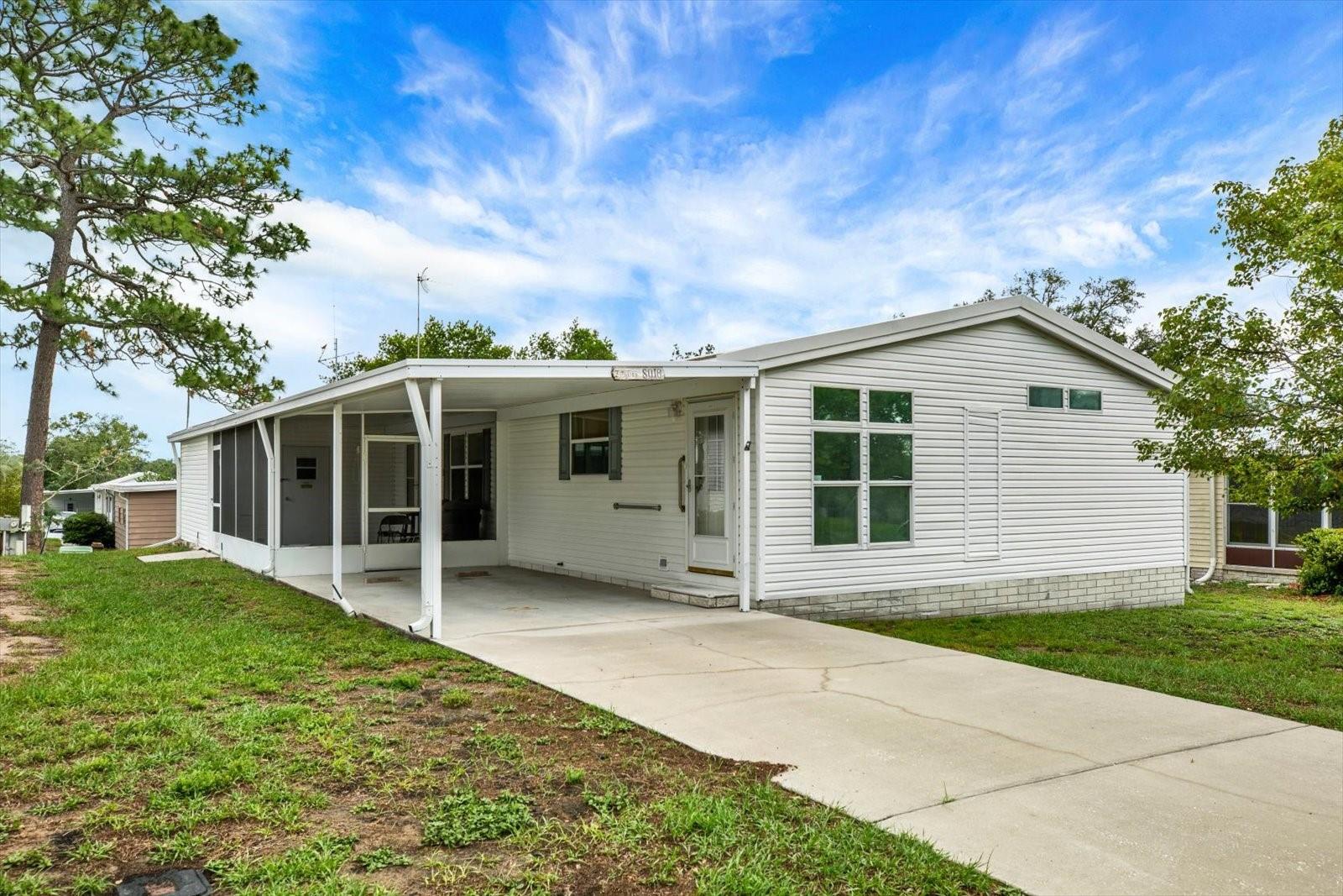 Welcome to your Florida dream home in the highly sought-after 55+ gated golf community of Brookridge! This beautifully maintained Palm Harbor home offers 3 bedrooms, 2 bathrooms, and 1,512 square feet of comfortable living space designed for easy, active living. Built in 1999 and featuring a NEW ROOF installed in 2024, this move-in-ready residence provides peace of mind and lasting value. Ideally located just moments from both the community clubhouse and golf clubhouse, you'll enjoy convenient access to the many amenities and social activities that make Brookridge one of the area's most desirable active adult communities. Inside, the light-filled floor plan welcomes you with spacious living and dining areas, ceramic tile flooring in the kitchen, generously sized bedrooms, and an inviting layout perfect for entertaining family and friends or simply relaxing in the Florida sunshine. Whether you're seeking a year-round residence or a seasonal retreat, this home offers the perfect combination of comfort, convenience, and lifestyle. Residents enjoy a gated entrance, championship golf course, clubhouse, fitness and recreational activities, community events, and a vibrant social atmosphere. Conveniently located near shopping, dining, medical facilities, and the beautiful Nature Coast, this exceptional home provides everything you need to enjoy the best of Florida's active adult living. Schedule your private showing today and discover why so many choose to call Brookridge home!