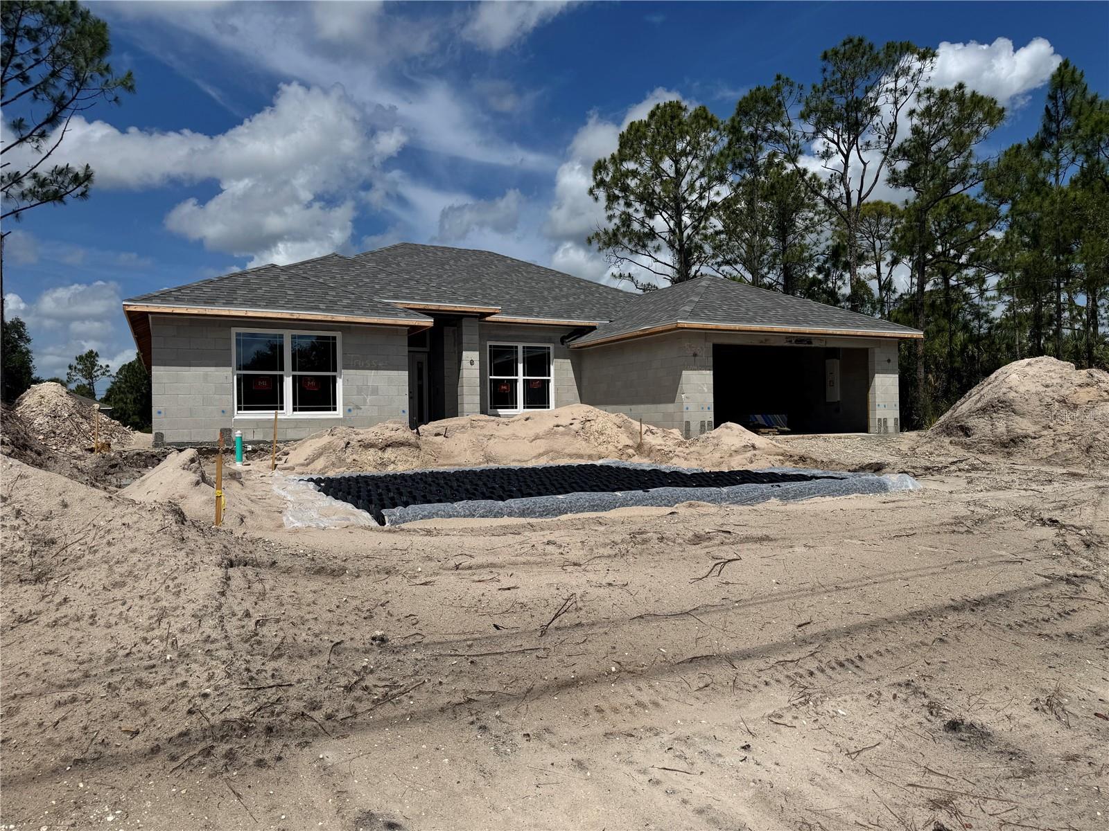 Under Construction. This beautiful home is located in the heart of North Port Florida, close to shopping, dining, entertainment, and everything else that SW Florida has to come and see. The home feathers 3 bedrooms and 2 baths, with a Flex Space. A split bedroom floor plan optimal for entertaining. This 2320 floorplan also offers a formal dining room that leads to a breakfast - bar kitchen with open slight lines to the family room. Fall in love with the bay window dining nook, designated mud room, and secluded master suite. Level 2 Ceramic tile floor, & Stainless Steel Appliances.