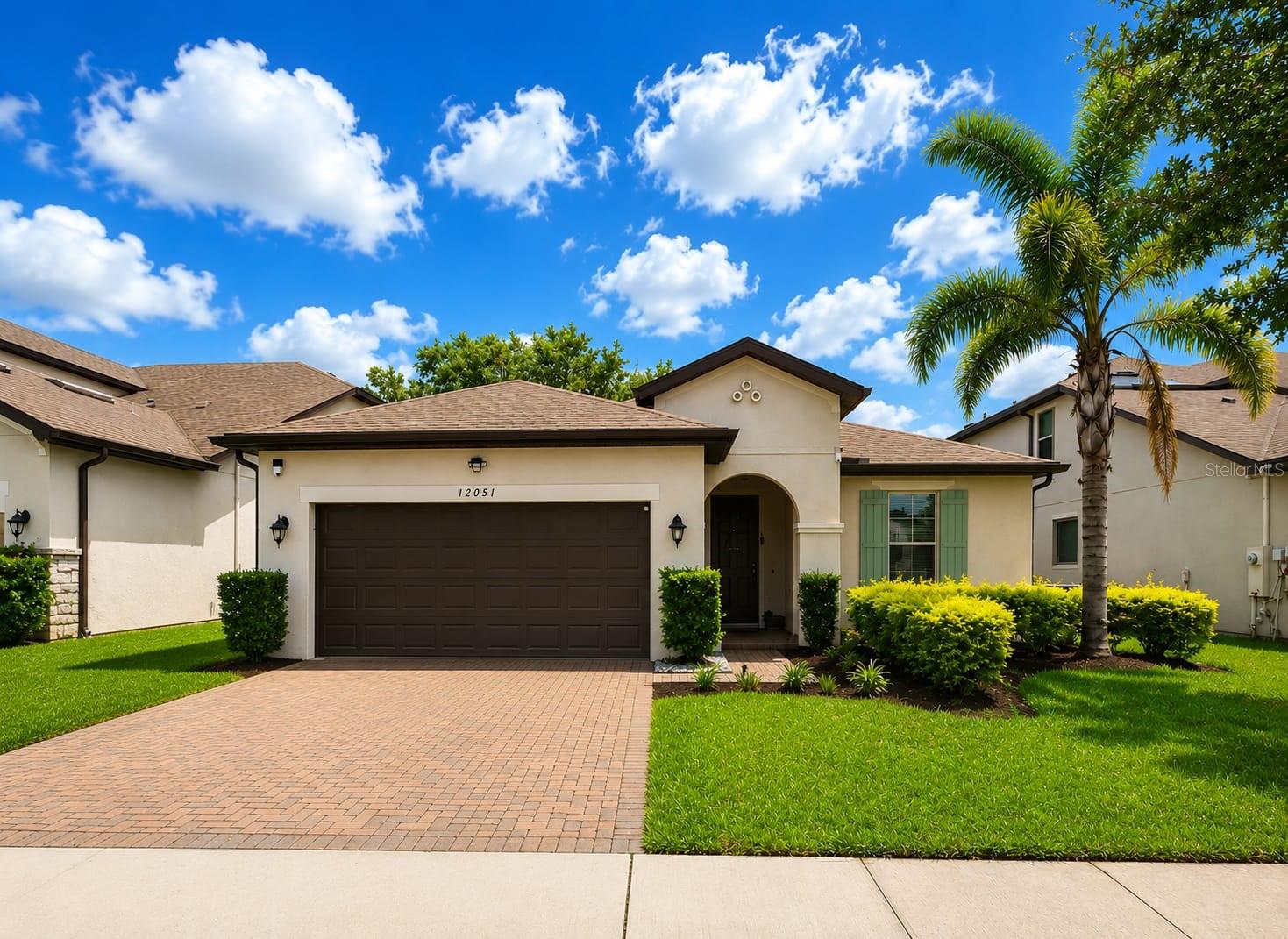One or more photo(s) has been virtually staged. PLEASE CALL OR TEXT. English-Español-Portugues.

Welcome to 12051 Ryegrass Trail, a beautifully maintained 4-bedroom, 2-bath residence located in the highly desirable Sawgrass community of Orlando. Offering 1,833 heated square feet of thoughtfully designed living space, this home combines modern comfort with resort-style outdoor living.

The open-concept floor plan features luxury vinyl plank flooring, a spacious living and dining area, and a stunning kitchen equipped with quartz countertops, stainless steel appliances, ample cabinetry, and a large center island perfect for entertaining. The primary suite offers a walk-in closet and a spa-like bathroom with dual vanities and an oversized glass-enclosed shower.

Step outside to your private backyard oasis featuring a sparkling pool with spa, an extended paver patio, and a fully fenced yard, creating the perfect setting for relaxing or hosting family and friends.

Ideally situated just 12 minutes from Orlando International Airport and Lake Nona, approximately 25 minutes from Downtown Orlando, and 35 minutes from Walt Disney World, this home provides easy access to major highways, shopping, dining, and entertainment. Residents of Sawgrass enjoy a convenient location and a vibrant community atmosphere.

Don't miss this exceptional opportunity to own a move-in-ready pool home in one of Orlando's fastest-growing areas. Schedule your private showing today!