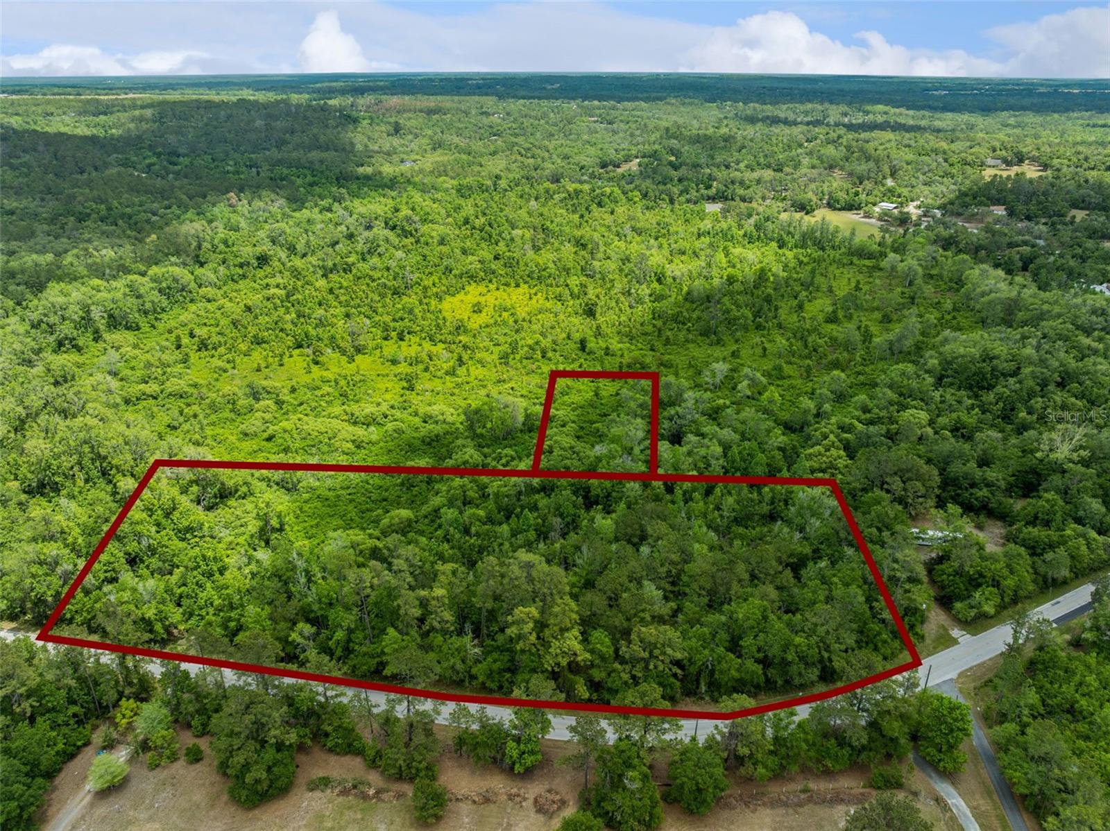 Discover the perfect opportunity to own 6.35 acres of wooded land in the peaceful countryside of Brooksville. Comprised of two parcels on Culbreath Rd., this property offers a rare blend of privacy, space, and natural beauty—ideal for building your dream home, creating a private retreat, or investing in land with long-term potential.

Surrounded by mature trees and native Florida landscape, the property provides a serene, rural setting while still being conveniently located near major roadways for easy access to nearby towns, shopping, and dining. Whether you’re looking to develop, hold, or simply enjoy the tranquility of nature, this acreage delivers flexibility and value.

These parcels are zoned AG (Agricultural), offering excellent flexibility for residential use. The zoning allows for single-family homes, modular homes, or mobile homes, with a minimum living area requirement of approximately 600 square feet—making it a great option for everything from a primary residence to a smaller footprint or rural getaway.
