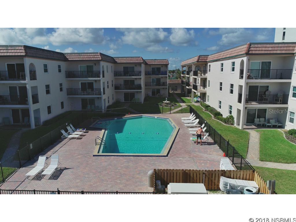 BEAUTIFULLY UPDATED WELL-FURNISHED GROUND FLOOR 2 BEDROOM 2 BATH OCEANVIEW CONDO IN A SMALL COMPLEX of condos located on the No-Drive beach. Sit on the patio and see and feel the ocean breezes in this small, intimate family of 33 condos. This condo is turn-key ready to vacation in or rent out!  From the fresh paint to the coastal furnishings it's the perfect place to call home.  Lots of natural light! Tile throughout makes it easy care after a day at the beach or by the pool. Wi-fi included in Maintenance fee. Parking space conveniently located directly outside your front entrance. No need to use elevators or stairs, walk right out to the Atlantic ocean from the patio. A Great Rental for solid Income! Come check out this beach condo today! ;LocationDescription: Condo ;Water: City