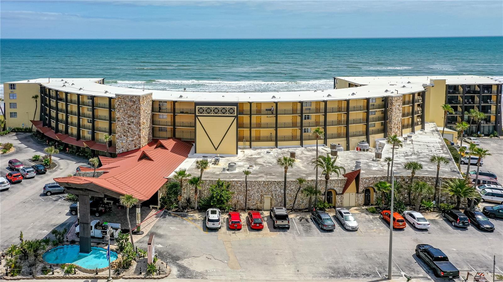 What if your beach day started the moment you opened the door?

Welcome to this beautifully updated ground-level unit at the Hawaiian Inn, just steps from the World’s Most Famous Beach. Walk straight out to the pool deck while still enjoying a phenomenal view of the Atlantic… because yes, you really can have both.

Inside, the space feels bright and open thanks to higher ceilings than upper-level units, giving it an airy, comfortable feel you’ll notice right away. The interior has been thoughtfully updated with tile flooring throughout, an updated kitchen and bathroom, a subway tile shower, and a custom patterned tile backsplash with a modern coastal feel that adds just the right amount of personality.

Offered fully turnkey, this unit is ready to go… whether you’re looking for a personal beach escape, a rental property, or a little bit of both.

And when you’re not in the unit? That’s where the fun really starts. Enjoy the oceanfront pool deck, grab a drink at the tiki bar, or take advantage of the heated indoor pool for year-round use.

Easy access, great flow, and a location that’s hard to beat right on Daytona Beach… this is the kind of place people come for a weekend and start wondering how to stay longer.