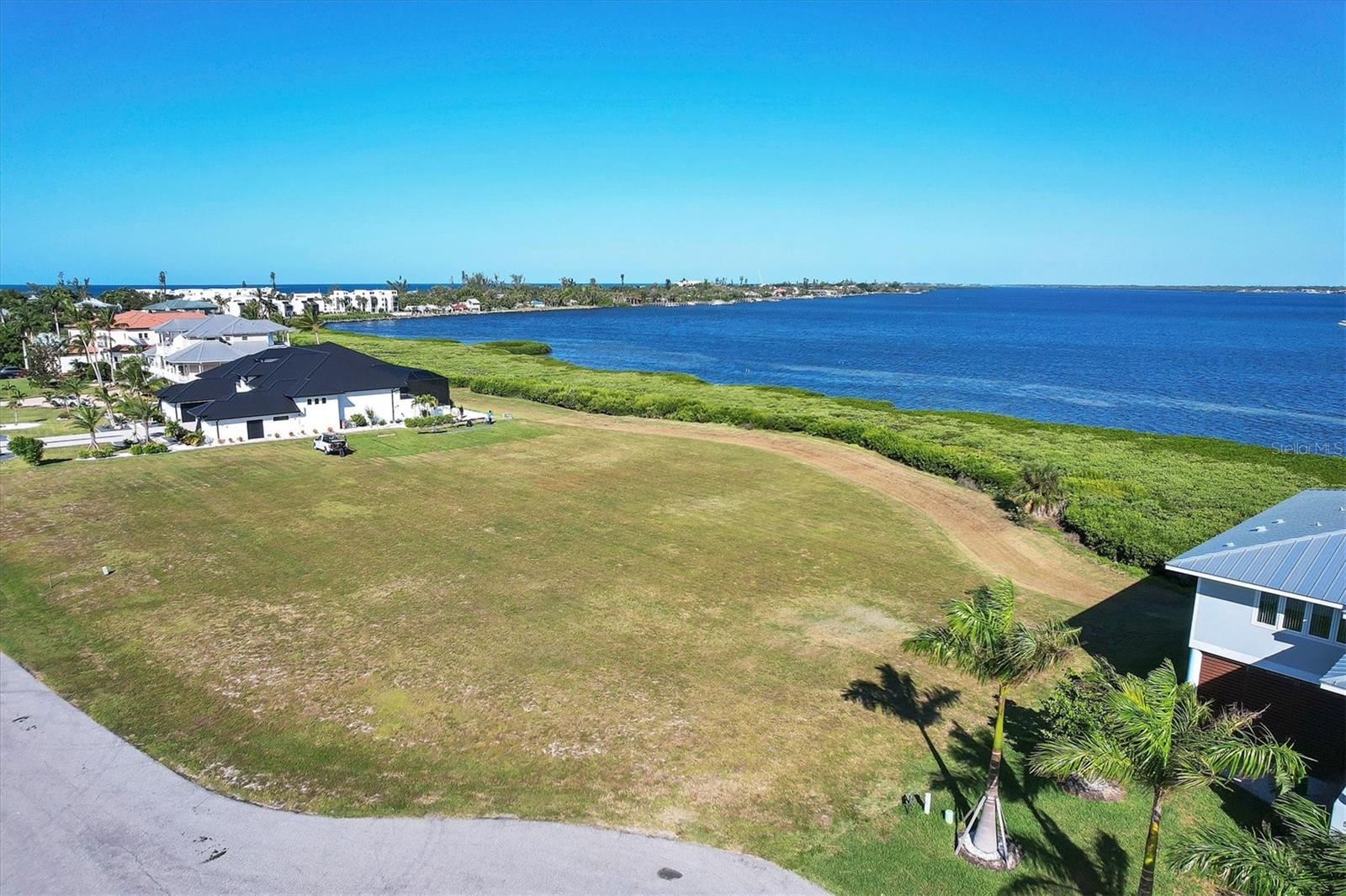1 ACRE ON THE INTRACOASTAL WITH DEEDED BEACH ACCESS & ASSIGNED BOAT SLIP IN A GATED COMMUNITY!
Experience breathtaking, unobstructed views of the Intracoastal Waterway from this rare one-acre homesite. Located within the exclusive gated enclave of The Pointe, this cleared, ready-to-build lot is the perfect canvas for your coastal dream home.
From the moment you enter the gated community, you’ll be surrounded by luxury estates nestled along the Intracoastal’s expansive shoreline. Just across the street, enjoy your deeded beach access—where sunrises over the water and sunsets over the Gulf make every day feel like paradise. This property also includes an assigned boat slip, giving you seamless access to boating, fishing, and exploring Florida’s pristine waterways. A full set of custom home plans is already available upon request, offering you a head start on creating your waterfront retreat.
Located just minutes from barrier-island dining, boutique shopping, and pristine beaches, this is a once-in-a-lifetime opportunity to own a piece of paradise on the Intracoastal.
Don’t miss this rare offering—schedule your private viewing today!