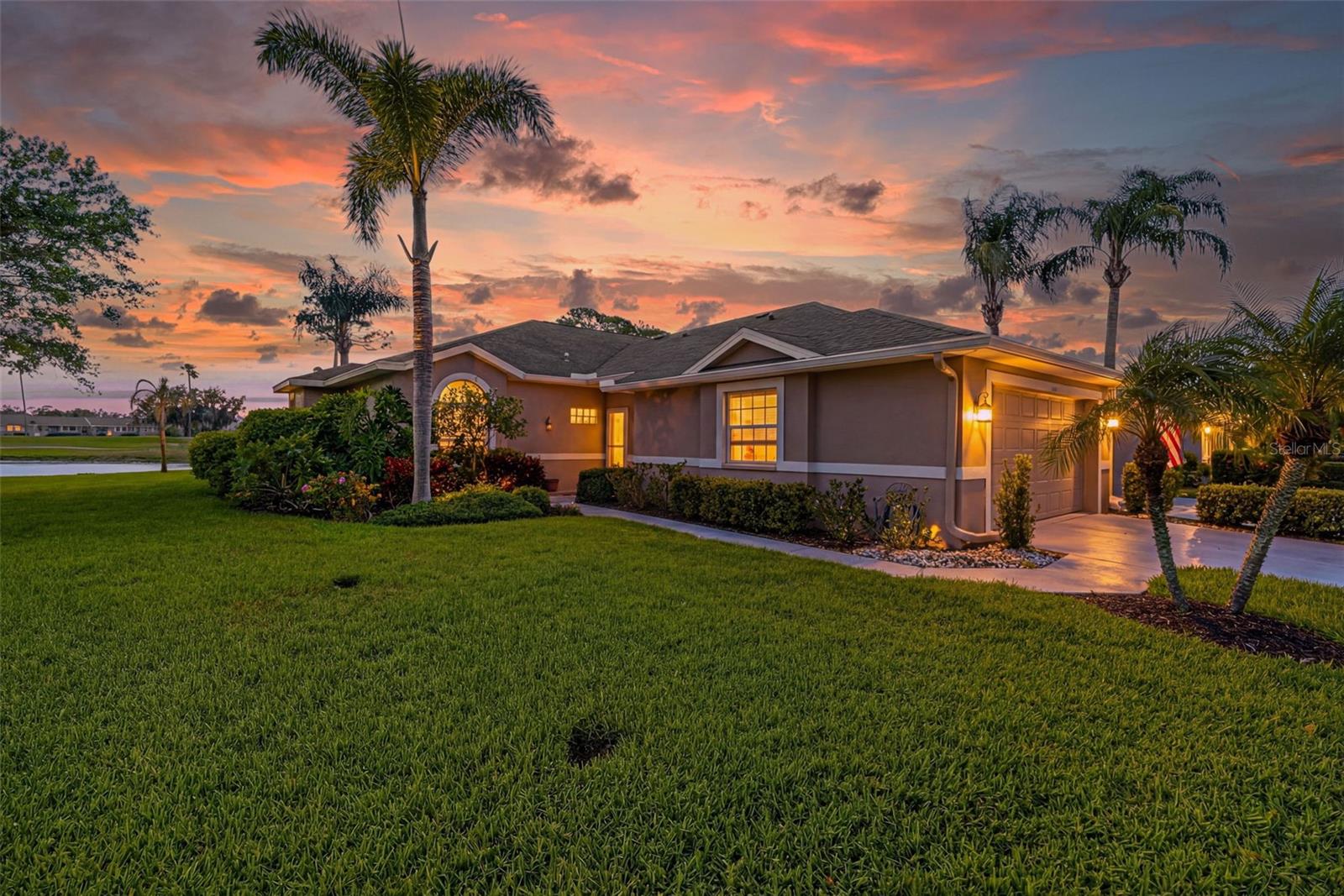 Don’t miss out on this rarely available Arlington end unit in Heritage Oaks Golf and Country Club with lake views overlooking the 12th hole. More natural light and added privacy make this home one of the most desirable locations in the community.

This two-bedroom plus office or den home offers the flexibility to easily convert into a three-bedroom. It features a rare private exterior entrance, ideal for guests, a home office, or added privacy.

This home is move-in ready with thoughtful upgrades throughout that is rare to find including crown molding, plantation shutters, travertine flooring, stainless steel appliances, bar area, and re-piping. The HVAC system was replaced six years ago, and the garage features all new electrical. Updated hardware throughout the home adds a fresh, modern touch. A hurricane screen less than one year old provides added protection and peace of mind.

The primary bedroom suite offers walkout access and a private bathroom with a jacuzzi tub, walk-in shower, and updated countertops and sinks. Inquire about the brand-new bedroom flooring that has been ordered and will be installed.

Enjoy a coveted two-car garage and true maintenance-free living with landscaping, roof, exterior painting, and driveway care included. The home is also equipped with fire sprinklers that are maintained by the association, adding an extra layer of safety and convenience.

Are you ready to create once-in-a-lifetime memories? Heritage Oaks is more than a community, it is a lifestyle. Enjoy championship golf, an award-winning pro shop, clay tennis courts with clinics and programs, five heated pools, a fitness center with classes and personal training, and both casual and fine dining led by a certified executive chef. A full social calendar and stunning sunset terrace create a vibrant and connected experience.

Set within a gated community with 24-hour guard service and an Audubon-certified nature preserve, you will experience beautifully landscaped grounds with deer roaming throughout. With strong reserves and a debt-free structure, this community offers both luxury and peace of mind.

Located in what many call the center of it all, you are 10.2 miles to Waterside Place, 11.3 miles to University Mall shopping and dining, 6.1 miles to Doctors Hospital, and under 17 miles to Lido Beach and Siesta Key Beach.

Opportunities like this do not come often. Schedule your private showing today!