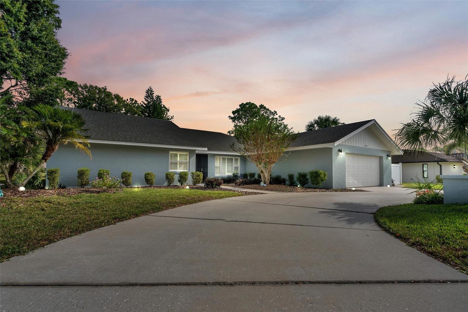 This well-maintained 4 bedroom, 3 bathroom pool home is in the desirable gated community of Cypresswood, offering stunning views of the golf course from your backyard. The family room, living room, and formal dining room are all adorned with beautifully polished hardwood flooring. The interior has been freshly painted, and all bedrooms and the formal dining room have plantation shutters. The kitchen has been updated with quartz countertops, stainless steel appliances, including a smart fridge and convection oven with built-in air fryer. The spacious family room has a cozy gas fireplace and overlooks the pool and golf course. The master suite boasts a recently renovated bathroom complete with quartz countertops, dual sinks, a large garden tub, and an exquisite walk-in titled shower. Enjoy a split floor plan for privacy. The screened patio overlooking the golf course is perfect for entertaining. Additionally, the roof is newer (2017), both AC units updated (one in 2018 and the other in 2022), exterior paint refreshed (2019), and a new gas hot water heater installed. This beautiful home is ready for you to make it your own!