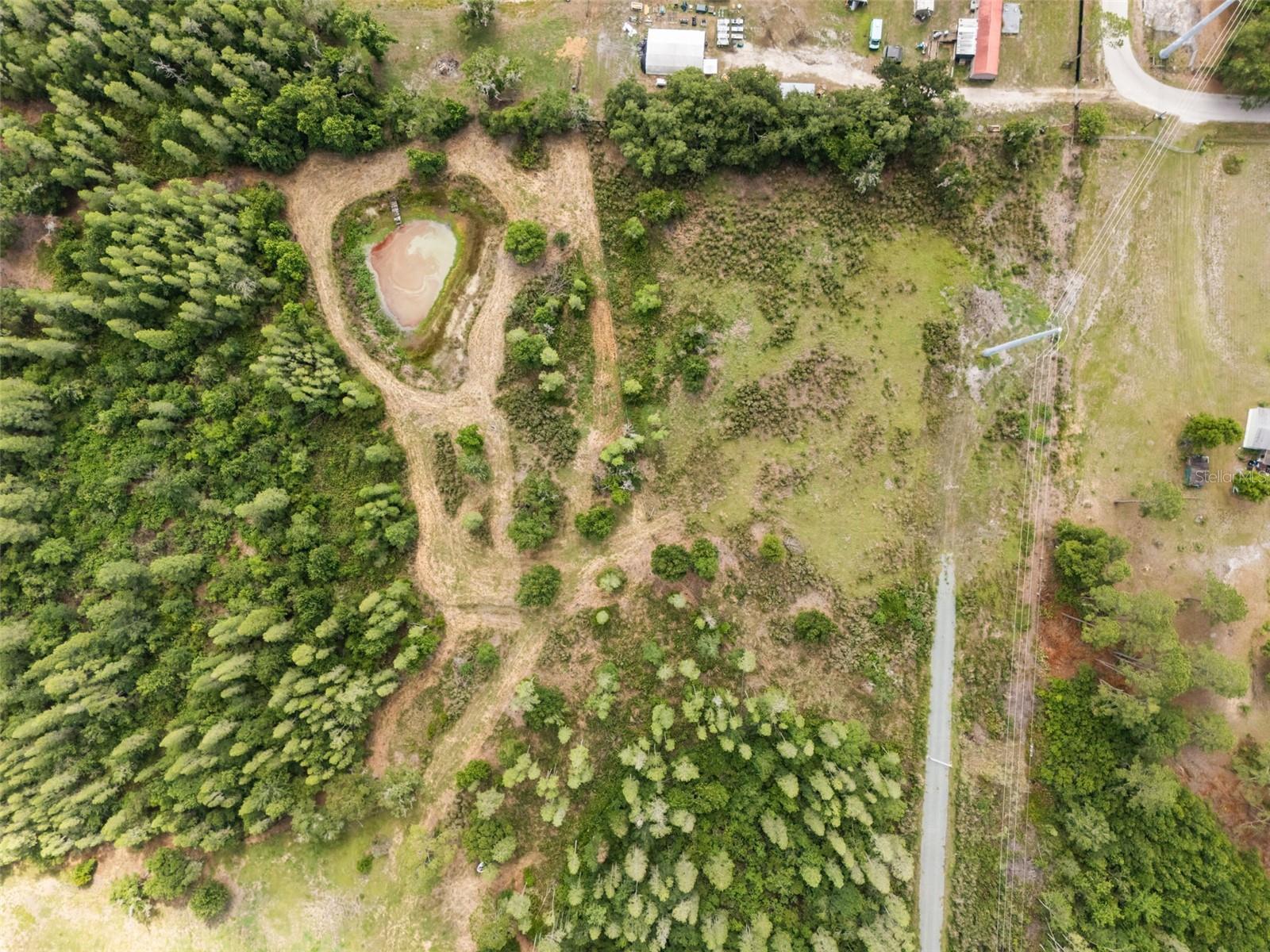 Discover the potential of this beautiful 9.51-acre parcel featuring a private pond, offering the perfect setting for your dream home, family compound, or long-term investment. Tucked away at the end of a quiet, private road in established Ko's Estates, this property offers exceptional privacy with no through traffic. Enjoy the perfect balance of peaceful country living and everyday convenience, just minutes from North Lakeland's shopping, dining, schools, and easy access to I-4 for commuting to Tampa or Orlando. With plenty of room to build, explore, and enjoy the outdoors, this is a rare opportunity to own a large piece of Florida land. Acreage with a private pond is hard to find—don't miss your chance to make it yours.