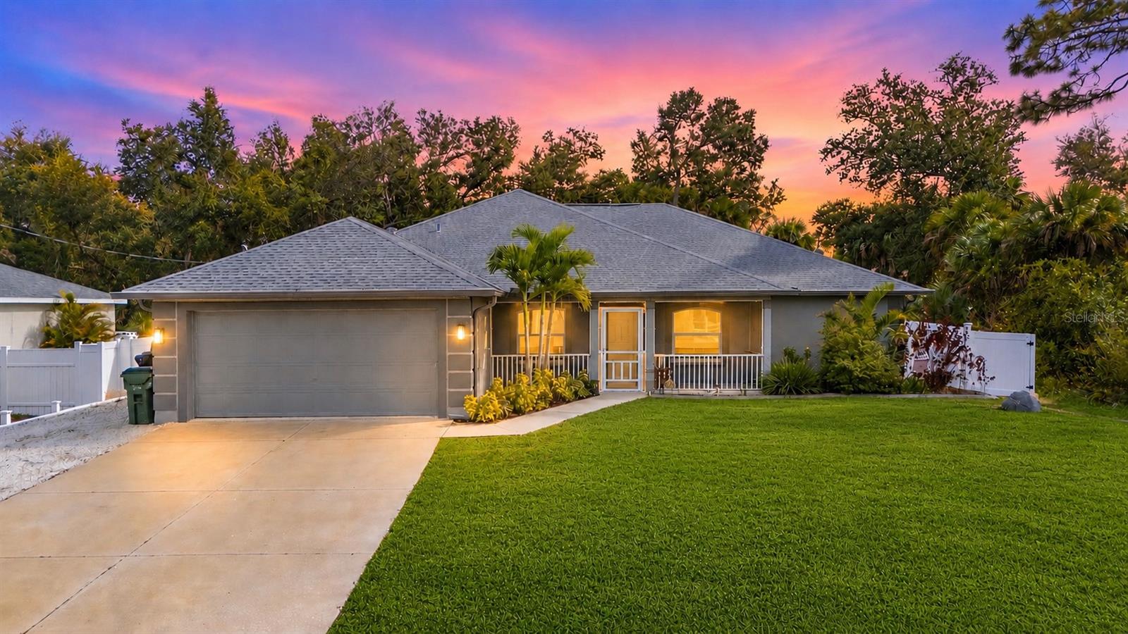 Step into a North Port home that's been refreshed from the studs out and is ready for its next chapter — over 2,000 square feet of beautifully reimagined living, anchored by a full 2023 remodel and a feature list that puts most homes on the market to shame. Three bedrooms, two baths, and two flexible dens give you room to actually live: one den lends itself perfectly to a formal dining room, while the other unfolds as a bright bonus space ready to become a home office, study, or creative studio. A wide screened front porch makes the first impression — calm, polished, unmistakably move-in ready.

Inside, vaulted ceilings lift the great room overhead while recessed lighting and crisp natural light spill across luxury vinyl plank flooring that runs seamlessly through every room — not a single transition strip in sight. The kitchen sits at the heart of it all with stainless steel appliances, a breakfast bar built for slow mornings, and a cozy dining nook tucked in for casual meals.

The split floor plan delivers true privacy where it matters. The owner's retreat is its own quiet wing, featuring dual walk-in closets and a spa-inspired bath with a walk-in shower lit by multi-color LED accents, dual vanities, and upgraded LED mirrors — the kind of bathroom that turns ordinary mornings into something a little more luxurious. On the opposite side of the home, two additional bedrooms share a fully updated bath, ideal for family or visiting guests.

Out back, a generous screened lanai extends the living space outdoors and opens to a fully fenced yard with plenty of room to roam, relax, or entertain — your own private backdrop for everything from morning coffee to weekend get-togethers.

Then there's the upgrade list — and this is where this home really separates itself from the pack: a 2022 roof, 2022 AC with blue-light purification, 2023 triple-pane impact windows rated to a powerhouse 175 mph, a whole-house reverse osmosis system (2023), instant hot water (2024), fresh exterior paint (2025), an extra-large storage shed (2022), and a newly added crushed-shell pad ready for your boat or RV. Translation: peace of mind for years to come.

Location seals the deal. You're minutes from shopping, dining, parks, golf, and recreation, with a short drive to award-winning Gulf Coast beaches, the brand-new Sunseeker Resort, and spring training ballparks for the Tampa Bay Rays and Atlanta Braves. Quick access to I-75, Sarasota, and Punta Gorda airports keeps the rest of Florida — and the rest of the country — easily within reach. North Port living, dialed in: relaxed, connected, and ready for you to make it home.