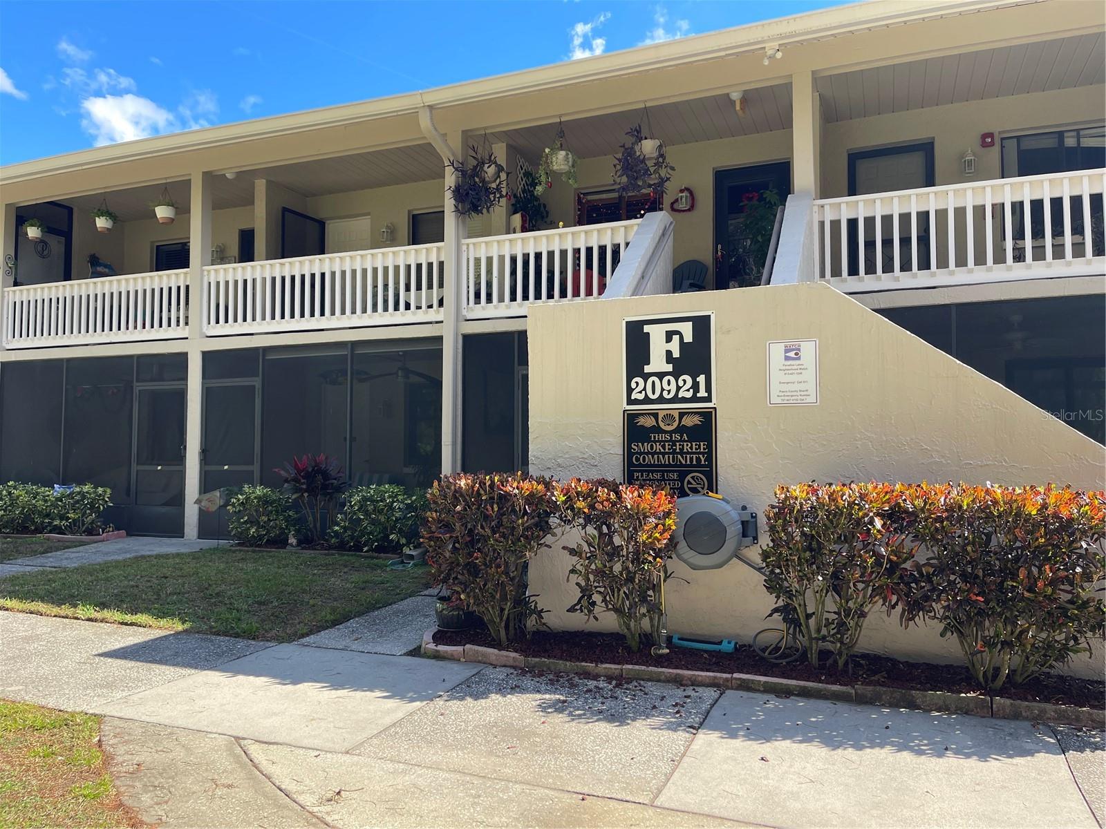Woo Hoo! Seller just dropped the price 10k. Looking for a weekend or seasonal retreat in a NUDIST community in Florida? A place with short term rental opportunities? A place where you can enjoy RESORT amenities that include pools, hot tubs, water volleyball, pool parties with life music, dances in the night club, sports on TV at the Key West Bar, a restaurant, karaoke, pickleball and other activates? Look no further. This "industrial style" modern decor condo with ambient mood lighting is turn key and ready for you! Ground floor condo with screened covered porch overlooks the nature preserve. Outdoor porch light is on a dimmer switch. Patio furniture will convey. This is a non smoking condo that is currently being managed by a property manager who has seasonal rentals currently booked two weeks in February, most of March, and first week of May. Schedule your showing to this property before more dates get booked up for the snowbird season. The art work, electronics, furnishings, appliances, linens, bedding, pots, dishes will convey with the sale of this condo. Keyless entry keypad enables you to change entry codes. Laminate flooring throughout condo is easy to clean. Kitchen has updated cabinetry, stainless appliances. And decorative sink. Bathroom has tub with shower and updated toilet. Bedroom has wall to wall closet with mirrored doors and in the closet is a single standing washer/dryer all in one. Plenty of storage space in closet. Windows are updated double pane energy efficient windows. Bedroom has ambient mood lighting at the ceiling with crown molding, a king size bed with built in drawers and sconce lighting. This condo is situated in Paradise Lakes. It is close to shopping. less than an hour to the Gulf. Minutes from public golf courses. Thirty minutes to Tampa International Airport. Minutes from Suncoast Expressway, i -75, and Interstate 275. Community is directly outside of HWY 41. If your looking for a full time resident homestead property this condo would also suffice. Included in the monthly condo dues is the maintenance of the exterior of the building which includes pressure washing and painting of the building. Roof repairs and replacement. Insurance on the structure of the building; cable, internet, water, sewer, garbage, maintenants of the gate, paving the roads, maintaining the common areas, dock, sun and fun pads, sidewalks, and landscape. With this care free opportunity it gives owners more time to spend on their qauilty of life and having fun with recreational activites and resort style living. To use the Resort amenities a membership to the club is recquired.