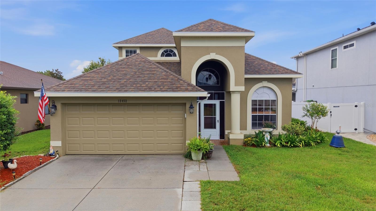 Welcome to this stunning, move-in ready home that truly checks all the boxes! Featuring 3 spacious bedrooms, 2 full bathrooms, 1 half bathroom, and a versatile bonus room, this beautifully maintained home is full of major upgrades, including a Brand-New Roof (January 2026), Updated A/C Units, a Brand-New Hot Water Heater (2026), and a New Water Softener with Reverse Osmosis Filtration System, providing peace of mind for years to come.

As you enter the home, you are immediately welcomed by soaring vaulted ceilings, an abundance of natural light, and an incredible open-concept floor plan designed to maximize comfort and spacious living. Beautiful bamboo flooring flows throughout the home, while the kitchen offers generous counter space, abundant cabinetry, and a charming breakfast dining area that adds warmth, convenience, and functionality.

Continue into the impressive living and dining area, where vaulted ceilings, a beautifully designed staircase, and an almost full wall of windows with triple sliding glass doors create a bright, inviting atmosphere and seamless indoor-outdoor living. Every space in this home has been thoughtfully designed to feel open, airy, and filled with natural light.

The spacious first-floor primary bedroom provides the perfect private retreat with direct access to the screened lanai. The en-suite bathroom features dual sinks with a vanity, a separate tub and shower, and a large walk-in closet. Also located on the first floor is the versatile bonus room, offering endless possibilities, along with a convenient half bathroom, laundry room, and access to the two-car garage.

As you make your way upstairs, the open loft overlooks the entire first floor, offering a beautiful view of the main living area below and enhancing the home's spacious, open design. From the loft, you will find access to the Jack-and-Jill bathroom with dual sinks, which connects to one of the two additional upstairs bedrooms, providing comfort and convenience for family or guests.

With its impressive layout, thoughtful design, and extensive upgrades already completed, this home offers the perfect opportunity to enjoy comfort, functionality, and peace of mind from day one. Don’t miss this incredible opportunity—schedule your showing today!