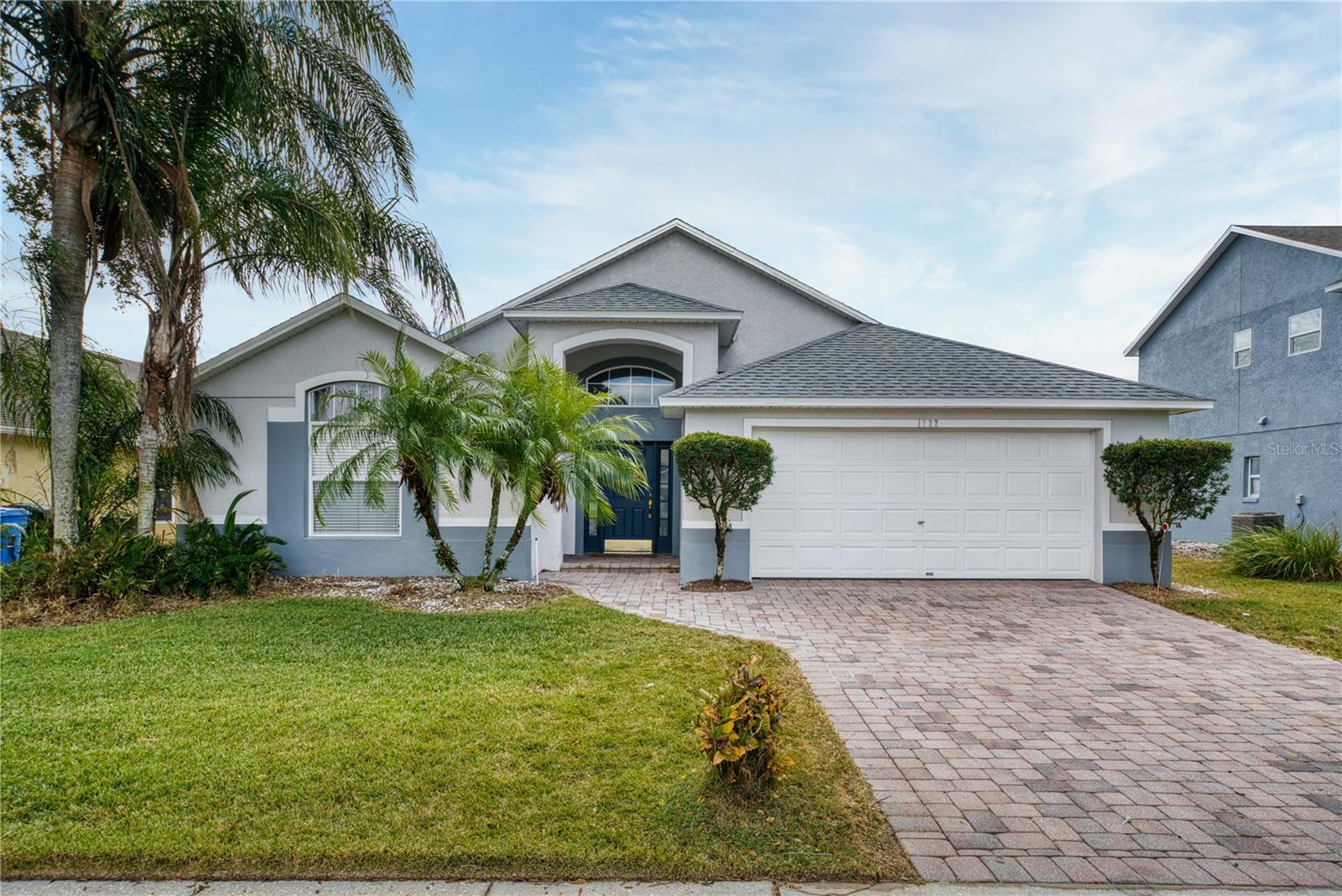 Welcome to this beautifully updated pool home in The Crossings at Little Creek. Located within one of Oviedo's most desirable communities, this home is zoned for top rated Seminole County schools and is just minutes from Hagerty High School, Carillon Elementary, Seminole State College, UCF, shopping, dining, parks, golfing, and major commuter routes. Thoughtfully maintained and tastefully updated, this move in ready home offers the perfect combination of location, style, and functionality. From the moment you arrive, you'll appreciate the pride of ownership and the extensive list of recent improvements, including but not limited to: a new roof (2020), HVAC (2020), luxury vinyl plank flooring (2021), updated stainless steel kitchen appliances (2021), new water heater (2024), saltwater pool conversion (2025), putting green with premium turf (2024), freshly painted exterior pool deck (2026), and a fully vinyl fenced backyard. Step inside to a spacious split floor plan with high ceilings and an abundance of natural light. The front of the home features two bedrooms with a full bath in between. The oversized living and dining areas provide wonderful room for entertaining, while the updated kitchen offers generous counter space, ample cabinetry, an eat-in dining area and updated modern appliances. Off of the living room you have your 4th bedroom/flex room. Currently set up as an office/guest space this room features beautiful French doors and overlooks the backyard. The private primary suite features a walk in closet and an updated en suite bath with dual vanities, a garden tub, and a separate shower. Step outside to your own backyard retreat featuring a sparkling screened saltwater pool, professionally installed putting green, turf, freshly painted pool deck, and plenty of space to relax, grill out or entertain! Additional highlights include an indoor laundry room, brick paver driveway, excellent curb appeal, and thoughtful updates throughout that allow you to move in with confidence. This is an incredible opportunity to own a beautifully maintained home in one of Oviedo's most sought after communities. Schedule your private tour today!
