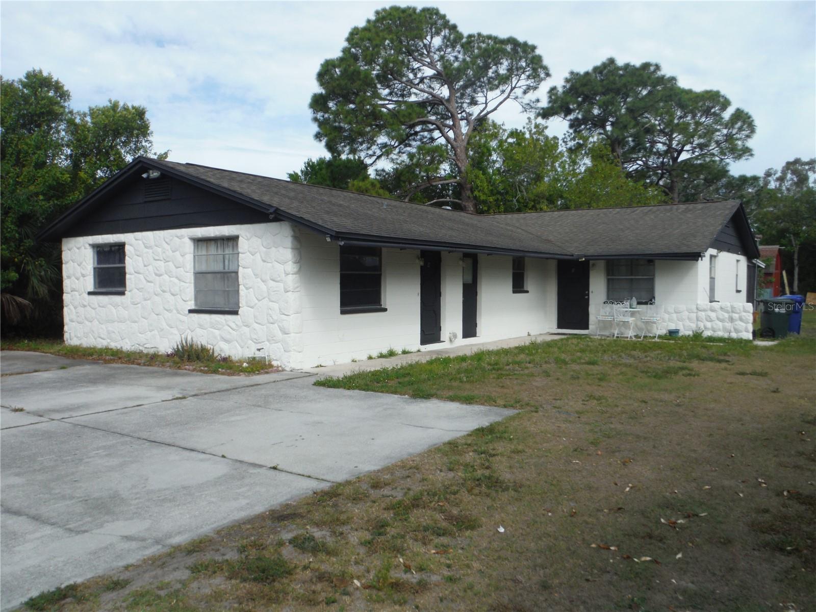 Duplex in excellent condition. Tenants have been there for over 10 years.  Tenant in #B says she has been there 28 years.  Tenants are on a yearly lease with an early termination clause that requires 30 days written notice and a $300 relocation payment, plus additional details. Terrific tenants who would like to stay. Separate water meters, separate electric meters, separate water heaters, separate HVAC, separate washer & dryer hookups. Huge Lot approximately 70X203 - Tenants mow the lawn. Plenty of parking. Freshly painted one story block building with tile floors. 4 Point inspections were done April 24/2024 and are attached in the MLS.  Please keep in mind that these are long term tenants and are on discounted rents The rents could easily be raised by $200/Month per unit to market rates or $400 total, for an additional $4800 per year.