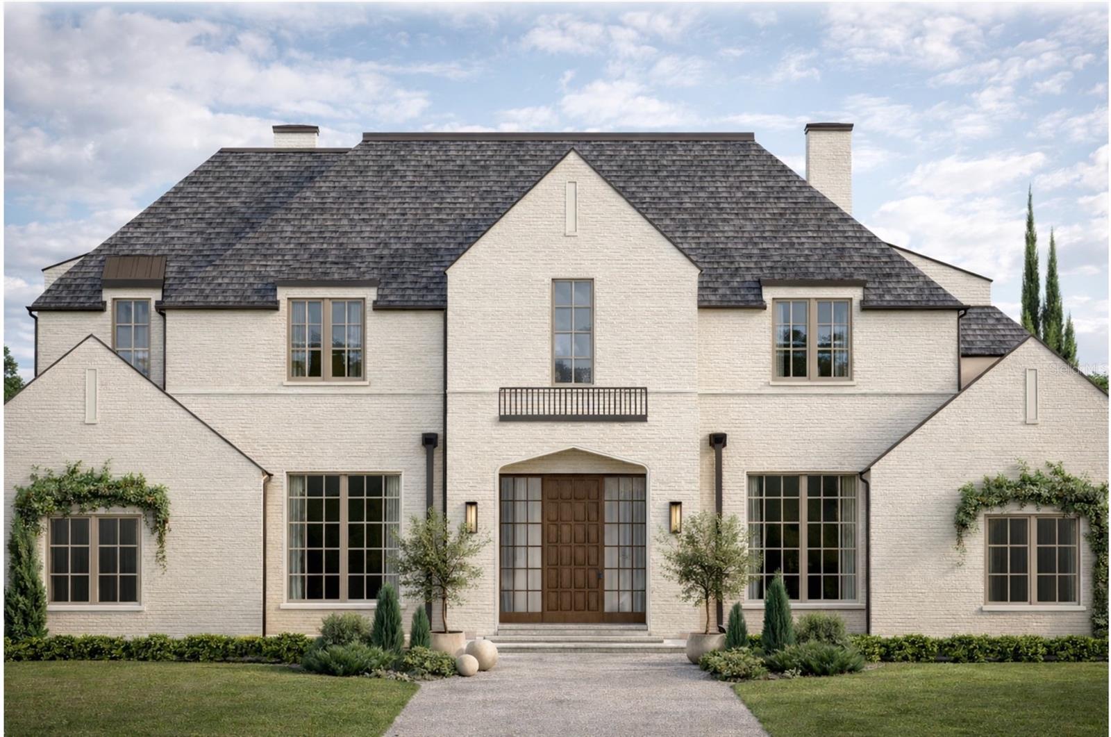 Under Construction. Currently under construction in the renowned golf course community of Isleworth, this exceptional residence by Goehring & Morgan, thoughtfully designed by Ashley Martin, offers 8,038 square feet of refined luxury living. Featuring 6 bedrooms, 6 full bathrooms, 3 half bathrooms, and a 4-car garage, this custom home showcases timeless architecture paired with elevated finishes throughout. The exterior is highlighted by a durable concrete tile roof and resort-inspired outdoor living featuring a stunning pool with sundeck, deck jets, and a fully equipped summer kitchen with a Wolf grill, designed for year round entertaining. Inside, the expansive great room is framed by solid oak wall paneling and anchored by a striking gas Isokern fireplace.The chef’s kitchen is designed for both function and style with dual islands, Sub-Zero appliances, and an adjoining back kitchen for seamless preparation and hosting. Additional gathering spaces include an elegant sitting room with its own fireplace and a dedicated wine room. Thoughtfully designed for everyday convenience, the first-floor laundry room features dual washers, dual dryers, and a dedicated folding station. Sophistication and functionality come together seamlessly throughout this extraordinary Isleworth residence.