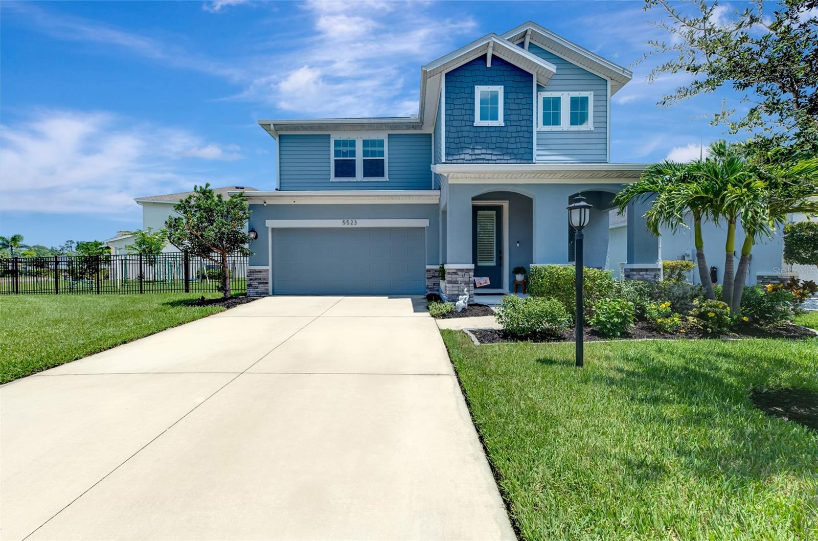 Discover this hidden gem in Moss Creek, an intimate and exclusive gated enclave of just 100 homes. Unlike many neighboring communities, Moss Creek offers exceptional VALUE with NO CDD fees and low HOA dues, providing a luxury lifestyle without the heavy tax burden.

Offered at a refreshed price, this 2021-built, DAVID WEEKLEY HOME sits on an oversized corner lot with serene water views. The fully fenced yard is designed for both relaxation and functionality, featuring a private play gym, a paver slab ideal for grilling or sunbathing, and a screened patio that provides shaded comfort from the Florida heat.

Attention to detail, this home delivers newer-construction VALUE without the wait. Wake up to peaceful water views and quiet mornings in a setting that feels private and tranquil. Designed for everyday comfort and effortless entertaining, the thoughtfully planned 4-bedroom, 2.5-bath layout includes a dedicated office, offering flexibility and privacy for today’s lifestyle.

HIGHLIGHTS INCLUDE: scratch- and water-resistant luxury vinyl flooring, quartz countertops in the kitchen, and tiled showers extending to the ceiling in the bathrooms. Additional upgrades include auto-on lighting in the garage and half bath, epoxy-coated garage floors, overhead storage, a Fast Track garage system with all attachments, and a 50-amp hookup, generator ready, with complete set of Storm Shutters, make summer storm planning easier.  The triple-lite UV HVAC system provides purified air throughout the home, and the fully irrigated yard enhances ease of maintenance.

Residents enjoy access to a private resort-style pool and cabana, along with close proximity to the recreational amenities of John H. Marble Park. Conveniently located near UTC and I-75, this home offers an easy commute to Sarasota, Tampa, and the world-renowned beaches of Anna Maria Island, all while providing a modern, energy-efficient retreat in a peaceful, nature-focused community.