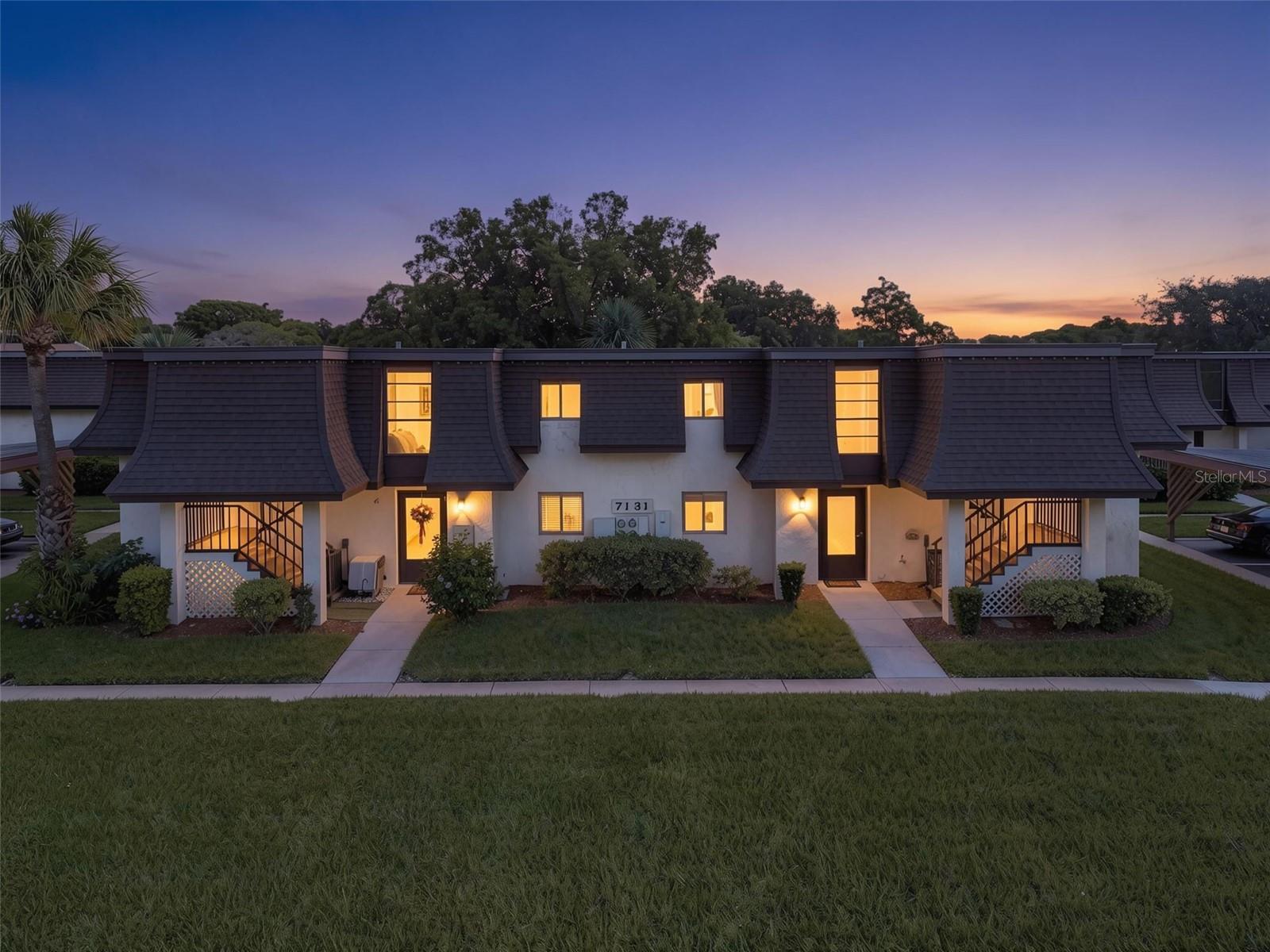 Enjoy easy Florida living in this beautifully updated first floor condo located in a welcoming 55+ community in New Port Richey. Offering a combination of modern updates and everyday convenience, this move in ready home is ideal for those seeking comfort and simplicity.

The interior has been refreshed with tasteful finishes, including updated flooring, modern lighting, fresh paint, brand new appliances, a new garbage disposal, and all new plumbing in the sinks and toilets. Natural light fills the living spaces, creating a bright and inviting atmosphere throughout. The thoughtfully designed floor plan includes an enclosed Florida room overlooking peaceful green space, offering flexibility for a sitting area, hobby room, or additional living space. Blackout drapes can also convey for added comfort and privacy.

The home also features a refinished walk in jetted tub that is fully operational, a second updated bathroom with washer and dryer hookups, and ample storage throughout. Additional improvements include a brand new water heater conveniently located in the closet behind the front door, a new electrical panel located behind the hallway mirror, and a new roof completed in 2025 and A/C 2023. 

With a covered carport located just outside and a ground floor setting that eliminates stairs, accessibility and convenience are key highlights.

Conveniently positioned near shopping, restaurants, medical facilities, and the charm of downtown New Port Richey, this condo offers a relaxed lifestyle with everyday essentials just minutes away. Service animals permitted.
