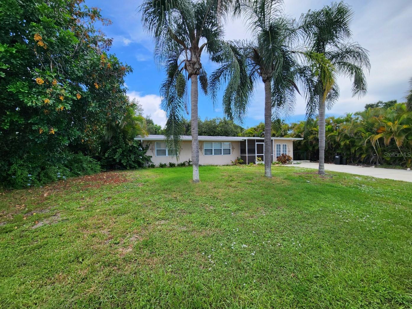 Virtually Staged. Live your best life just minutes to beaches, boating, golf, biking, shopping and dining with no Required Flood Insurance. Home is completely  in Zone X. (insurance agent verified that a lender cannot require flood insurance for this property)  There is a park nearby with pickleball, basketball, a nature trail and more.  It's just a 4 min ride to the ferry that will bring you to a private beach (membership required) and boat launch or 10 minutes to a few public beaches and a public boat launch.  This home features a bonus room with private entry for guests and a nicely landscaped yard offering privacy for outdoor activities like BBQing or soaking up the sun. The 10x20 shed is great for storing yard equipment. The roof was replaced in 2022. All the windows have blinds and the rooms all have ceiling fans. The driveway was extended and culvret put in in 2021. The home is elevated and has never flooded. There is a water softening system included as well as washer and dryer. Enjoy all that South Venice has to offer with optional memberships available through the South Venice Civic Association. For approximately $70 annually, members can participate in community events, activities, and pickleball. Optional access to the South Venice Beach Ferry is available for approximately $200 per year, providing transportation to a private Gulf beach. Boating enthusiasts can take advantage of the community boat ramp for approximately $150 per year, while kayakers, canoeists, and paddleboarders can enjoy access to the community launch for approximately $100 per year. Venice is also home of the Legacy Bike Trail that offers 20 miles of paved biking plus other connecting bike trails like the Venetian Waterway Trail where you can bike directly to Caspersons Beach.