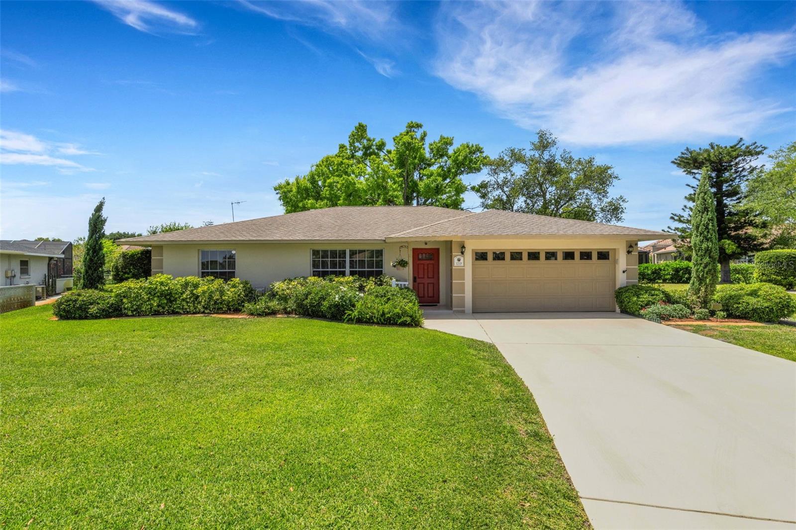 Welcome to Village Green, one of the area’s most beloved neighborhoods where space, charm, and location come together beautifully. This meticulously maintained 3 bedroom, 2 bath home offers over 2,000 square feet under air, one of the largest floor plans in the community, and is tucked away on a side street in a NO FLOOD zone for added peace of mind. 

From the moment you arrive, the setting feels special. Situated on an expansive approximately 1/3 acre lot, rare for Village Green. The backyard is truly a private retreat, filled with lush, mature landscaping, two storage sheds, and a striking, one-of-a-kind stag horn plant that will remain with the home. It’s the kind of outdoor space that invites you to slow down, unwind, and enjoy the Florida lifestyle.

Inside, the home offers a warm and inviting flow with generously sized rooms, abundant closet space, and charming built-in bookcases (can be easily removed if desired) The open layout is ideal for both everyday living and entertaining, while the large enclosed patio transitions seamlessly to an expansive screened porch; perfect for morning coffee, evening gatherings, or simply enjoying the breeze year-round.

Thoughtfully updated and lovingly cared for, recent improvements include a 2023 A/C system with UV light, kitchen water filtration sytem, stainless steel kitchen appliances approximately 2 years old, washer and dryer approximately 3 years old. Additional features such as a deep well for irrigation, attic fan, and new garage refrigerator add comfort and convenience. Lots of shelving and storage in the garage.

Ideally located just minutes to the Gulf beaches, shopping, and dining, this is a rare opportunity to own a spacious home on one of the largest lots in Village Green offering the perfect blend of indoor comfort and outdoor beauty. CALL TODAY to schedule your showing!!