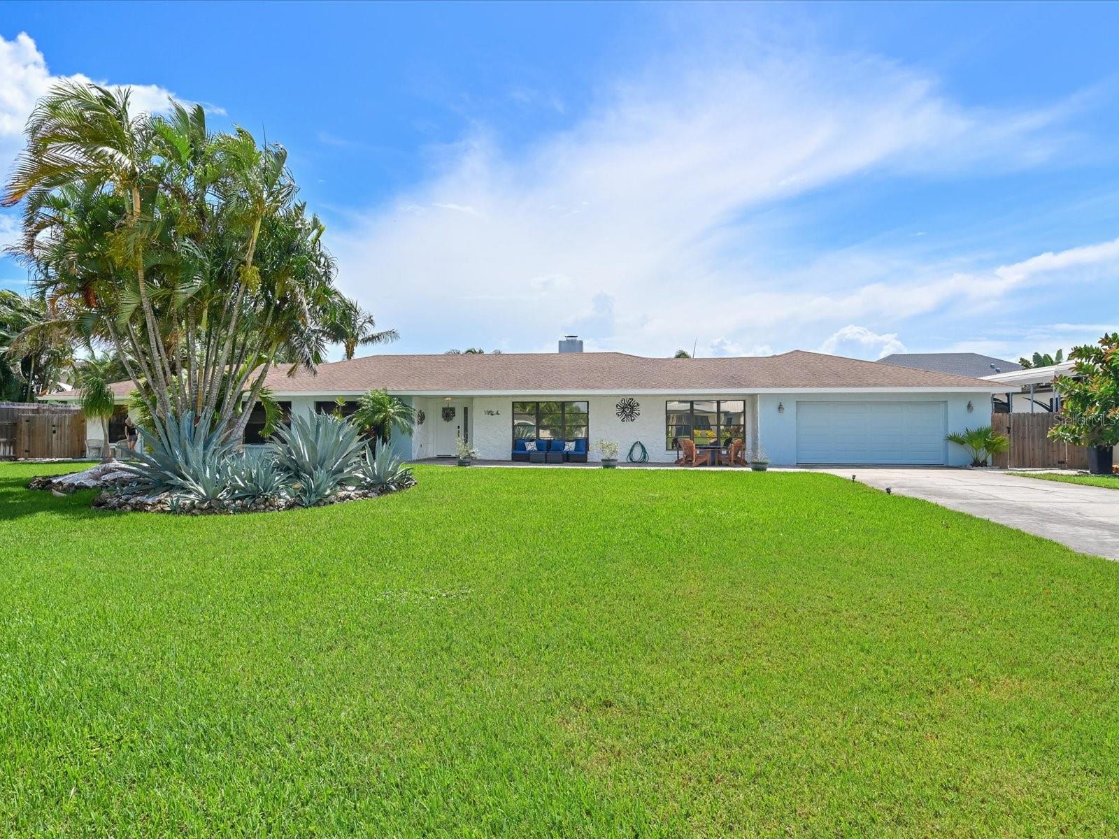 Northwest Bradenton Paradise!  Welcome to your own slice of paradise in highly desirable northwest Bradenton. Discover the perfect blend of coastal charm, modern upgrades, space, style, and Florida outdoor living in this beautifully updated home with 4-bedrooms, 3-baths and bonus room offering more than 3,200 square feet.  Designed with an open-concept floor plan, the home features a gorgeous, updated kitchen, luxury vinyl flooring, spacious and bright living and dining areas, fireplace and tasteful updates throughout. All of these features create the perfect, move-in-ready home that's ideal for both everyday living and entertaining. The expansive indoor living spaces flow seamlessly to an impressive outdoor oasis featuring a private pool and open patio space that provides plenty of room to relax or host family and friends. The custom tiki bar, complete with a durable metal roof and generous covered bar seating, creates the perfect setting for enjoying Florida's year-round outdoor lifestyle. There's a separate covered and screened lanai directly off of kitchen and main bedroom as well. The versatile bonus room with its own private entrance opens directly to the pool and tiki bar, offering endless possibilities as a home office, game room, media room, fitness space, guest retreat, or potential in-law suite. An attached exterior storage room and workshop provide additional space for hobbies, projects, and extra storage. Ideally located in Northwest Bradenton, this exceptional home is just minutes from Anna Maria Island, Gulf beaches, Robinson Preserve, Palma Sola Bay, shopping, dining, parks, and excellent schools. No HOA and rentals are allowed. With its spacious layout, updated finishes, outstanding indoor and outdoor living spaces, and sought-after location, this home offers the best of the Florida lifestyle!