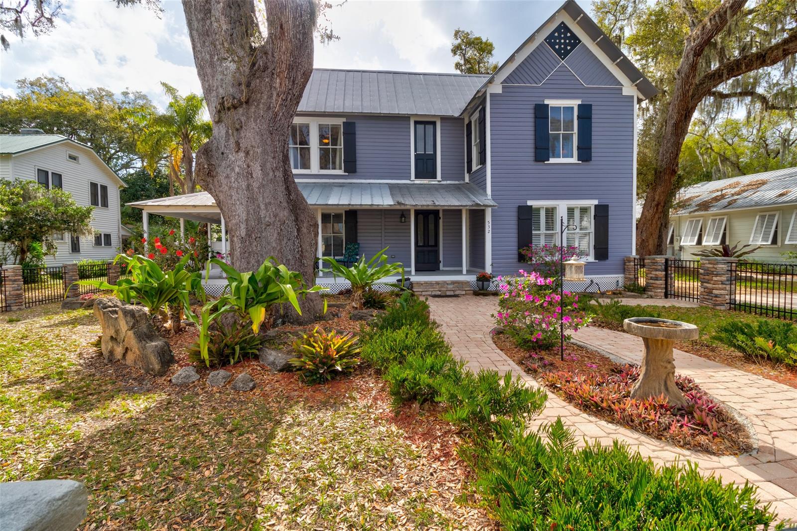 Built in 1889, this historic property has been owned by the same family for 5 generations and is now ready for a new owner to love and enjoy its pleasures and charms.  Featuring 4 bedrooms and 3 and half baths, this home also has a 2 car detached garage and a spacious brick paved, screened in lanai, inground salt water pool and spa for your comfort and entertaining.  Situated in the heart of New Smyrna Beach's downtown, just 3 blocks off canal st, it sits on 1/3 of an acre of beautifully manicured land.  Pride of ownership resonates throughout the home as it has been meticulously maintained and upgraded through out the years.  Upgrades include electrical, plumbing, kitchen, inside laundry and downstairs master suite.  Additional upgrades include foam sprayed insultation in the under the house, and newer air-conditioning units for both upstairs and downstairs, fresh interior and exterior paint, new river rock and freshly laid sod.  No stone has been left unturned, in keeping this house maintained and in top notch condition.  So sit back and enjoy your morning coffee on the wrap around porch and move right in and start to enjoy all New Smyrna has to offer in you new, home sweet home. ;Water: City