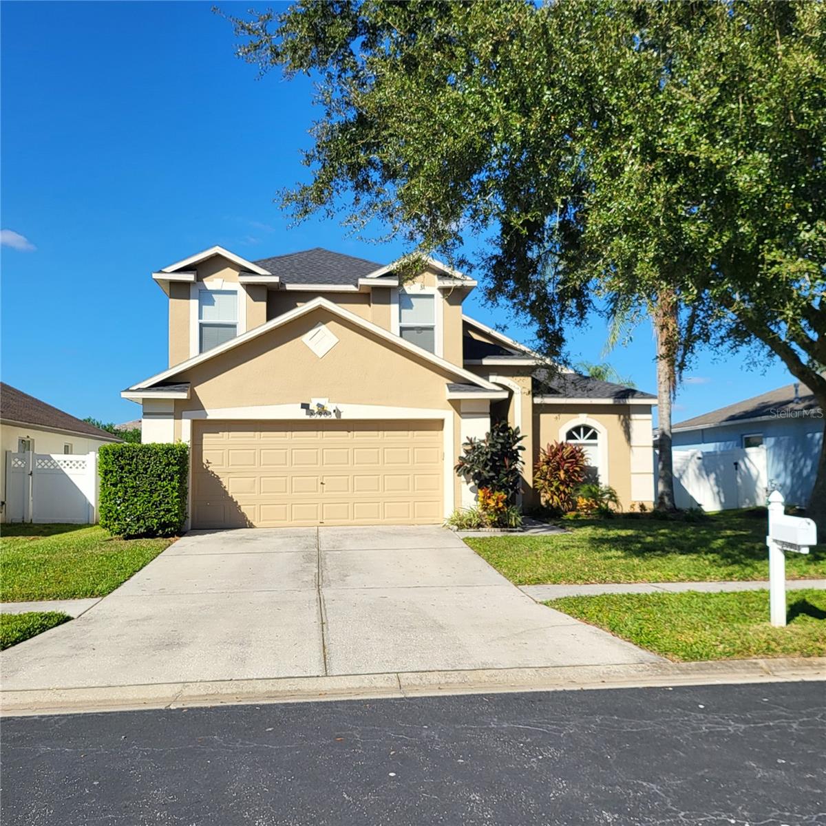 AVAILABLE IN SEPT! UPGRADED & UPDATED! Ideal Grand Oaks location just off SR54 only a few miles from I-75. Don't wait, call today on this spacious FOUR bed/TWO + HALF Bath home with XL FENCED BACKYARD! NEWER kitchen cabinets have an upscale design and soft close feature. Beautiful GRANITE COUNTERTOPS in Kitchen and ALL 3 Baths. Kitchen features all STAINLESS-STEEL APPLIANCES including Dishwasher, Range, Microwave, side by side Refrigerator and deep S/S sink with disposal. Canned lighting, a closet pantry and room for a table too! TILE FLOORS throughout downstairs living area. Carpet on stairs, hallway and all bedrooms. Coordinating brushed bronze light fixtures & door hardware throughout. Open & Bright floor plan includes open stairway with spindle banister & loft style landing upstairs overlooking the first floor living area. Cozy FIREPLACE in living room for cool winter nights. PRIMARY SUITE is located on first floor behind DOUBLE DOORS and features a larger WALK-IN closet, EN-SUITE BATH with DUAL VANITIES, A walk-in shower, GARDEN TUB and linen closet. Rounding out the first floor is the laundry closet with washer/dryer hookups, a powder bathroom & large storage closet located under stairs with lighting and carpet. Upstairs you'll find 3 spacious bedrooms with ceiling fans and built-in closets. One overlooks the backyard and the two up front have a bench seat in front of the window. The upstairs full bathroom offers granite counter with beauty bar, toilet and tub/shower combo. Grand Oaks features A CLUBHOUSE WITH FITNESS ROOM, LARGE POOL/SPA, KIDDIE POOL, COVERED PLAYGROUNDS, SWINGS, SAND VOLLEYBALL, BASKETBALL & miles of sidewalks. It is conveniently located at the Wesley Chapel/Land O Lakes border off SR54 just minutes from 1-75. The Grove shops, Wiregrass Mall and Tampa Premium Outlets + lots of restaurants nearby. Tenant responsible for utilities (electric, gas, water/sewer & internet/cable), lawncare and renter's insurance. HOA approval is required prior to lease signing and a background check is required at every renewal. Up to 2 dogs allowed at landlord and HOA discretion.