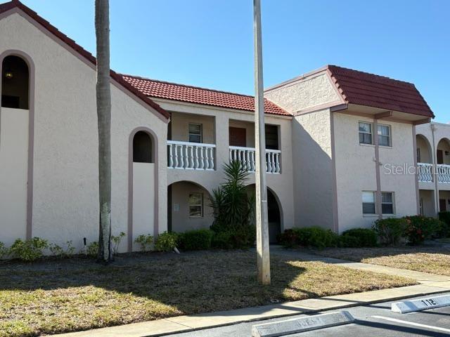 Ground floor 2 bed 2 bath split bedroom unit in Antigua Condo in 4 acre community. Newer light cabinet kitchen w/ quartz counter tops & marble floors. Bathrooms both have custom cabinetry w/ quartz countertops. 2019 hot water heater, 2020 HVAC , newly painted. Newer appliances. Your newer washer /dryer in your own private storage laundry room across condo door. plenty of storage !  Both bedrooms have walk in closets. All ages live here and allow 2 pets under 25 lbs. Right next door to pool and clubhouse with pit for cooking . Clubhouse also has billiards, foosball, TV family room area and low cost rental for parties!  Dead end private street so great for nature lovers, walking . Across from Bardmoor country club social and golf memberships available . Near Brian Dairy Rd for access to Tampa and North Pinellas county .I-275. Maintenance fee incl: water, sewer, garbage, basic cable, internet, reserves,
