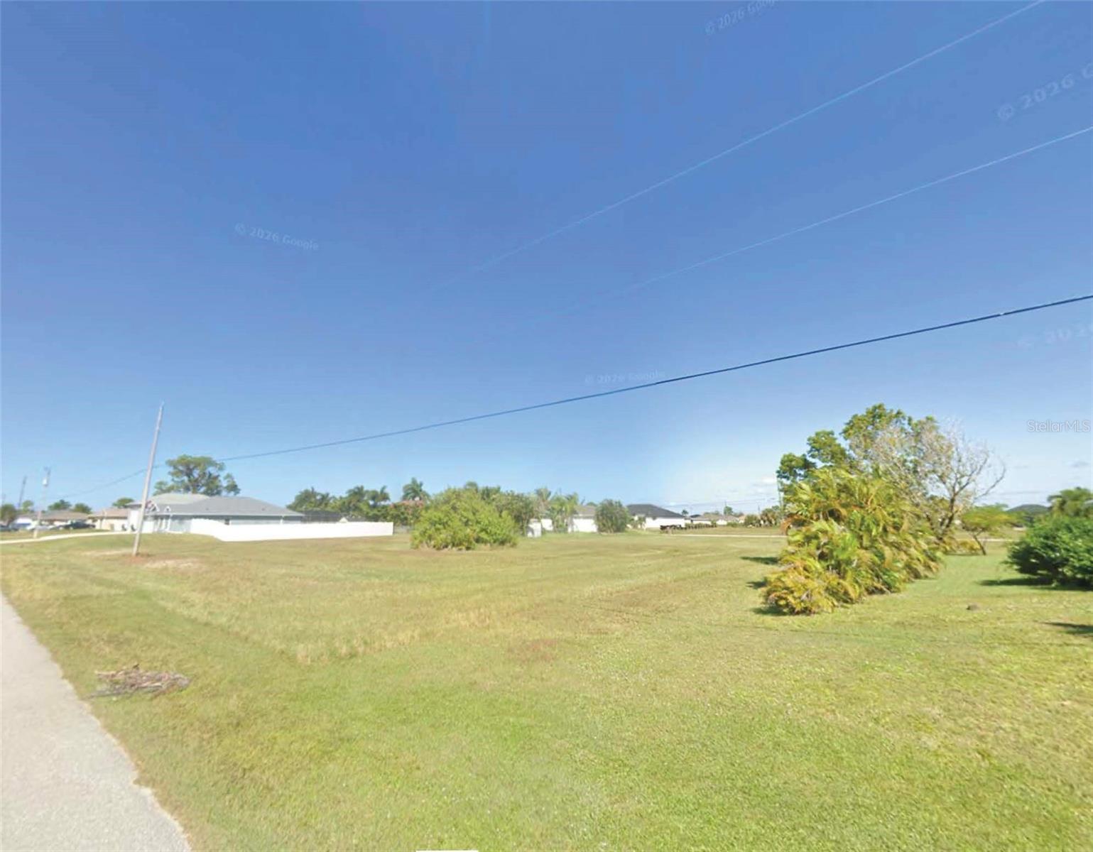 Rare oversized triple residential lot in the rapidly growing Northwest Cape Coral area. Comprised of Lots 47, 48, and 49, this spacious homesite provides ample room for a custom residence, oversized garage, workshop, RV storage, or expansive outdoor living area. Located on a paved street with newer homes nearby and convenient access to shopping, dining, schools, parks, and boat ramps. No HOA. Seller is offering additional vacant land parcels in Florida. Contact listing agent for availability and package opportunities.All information is deemed reliable but should be independently verified.