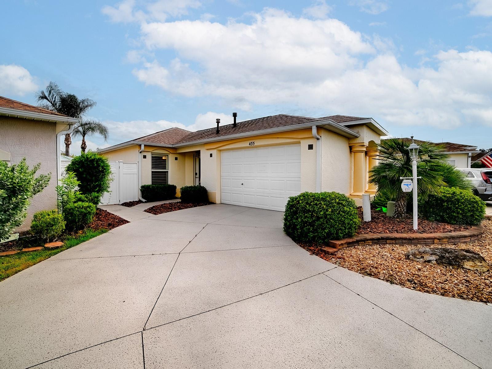 NEW TO MARKET! 
EXPECT THE UNEXPECTED! This is a beautiful courtyard villa in the Village of Mallory. NO CARPET HERE. PLANTATION SHUTTERS. GAS AREA. BLOCK AND STUCCO. PRIVACY. GREAT LOCATION! You can have it all. The entryway has leaded glass for a bright and light area. Step into an open floor plan with an updated kitchen. You have stainless steel appliances and a lengthy breakfast bar. The dining room has sliders to your outside patio. The main living area opens to the enclosed lanai that offers plenty of sunlight. Both bathrooms have been updated. The primary bedroom closet is organized which offers lots of space. Landscaping is lovely and easy to maintain. This home is clean and bright and ready to move in. The Village of Mallory is just minutes from Lake Sumter Landing where you have free nightly entertainment as well as shopping, banking, and multiple restaurants. Mallory Country Club is just around the corner for you. Coconut Cove would be your nearest Regional Recreation Center. EXPECT THE UNEXPECTED! Furniture is negotiable.
