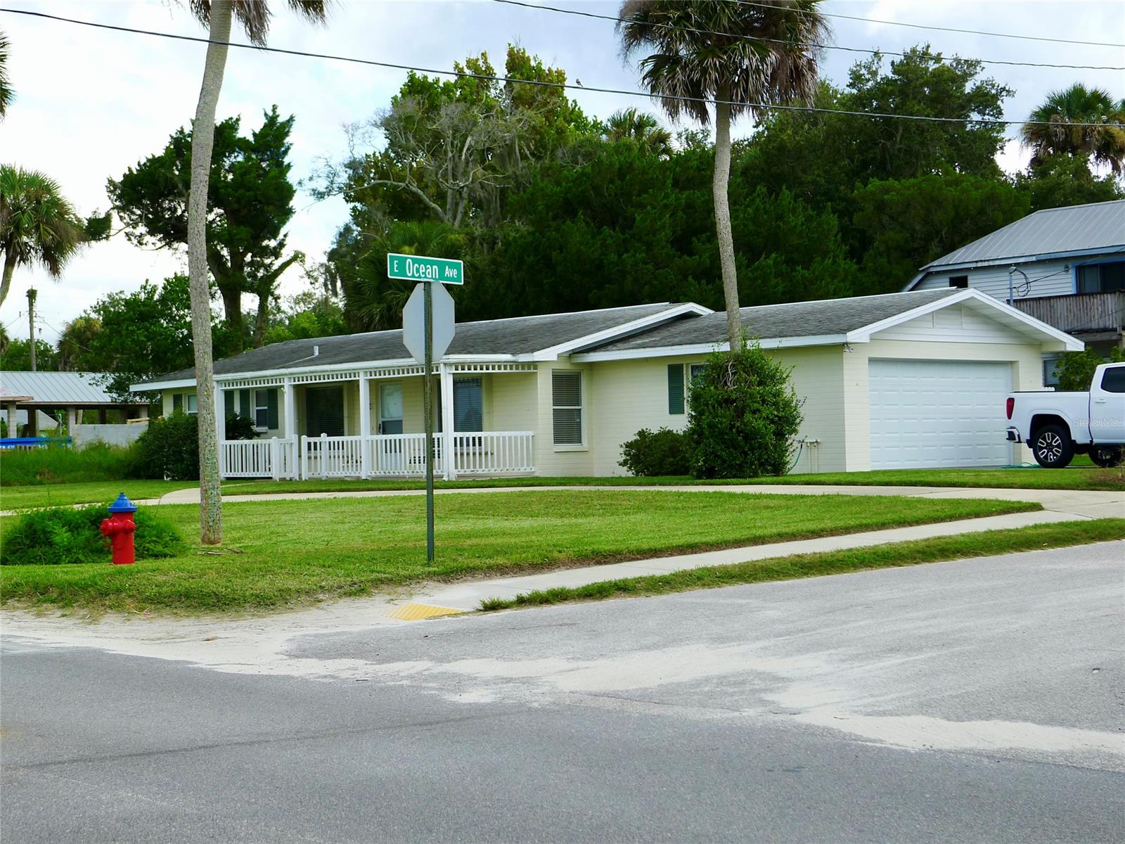 Sunrise views across the Intracoastal await! This is your chance to live across the street from the Intracoastal Waterway on S. Riverside Drive. This 98 x 108 corner lot is directly across the street from Edgewater's Menard-May Park w/ Boat Ramp, Dock, playground and picnic area. The current home is a solid, concrete block residence offering an open floor plan with large kitchn, great room, 3 bedrooms and 2 full bathrooms. This property offers you the opportunity to invest in location, location, location - and to refresh, renovate or build your dream home. Two Car Garage, Circular Driveway and spacious front porch. This well built home is offered AS IS. All measurements are approximate, and Buyer is responsible to verify all dimensions. ;Water: City