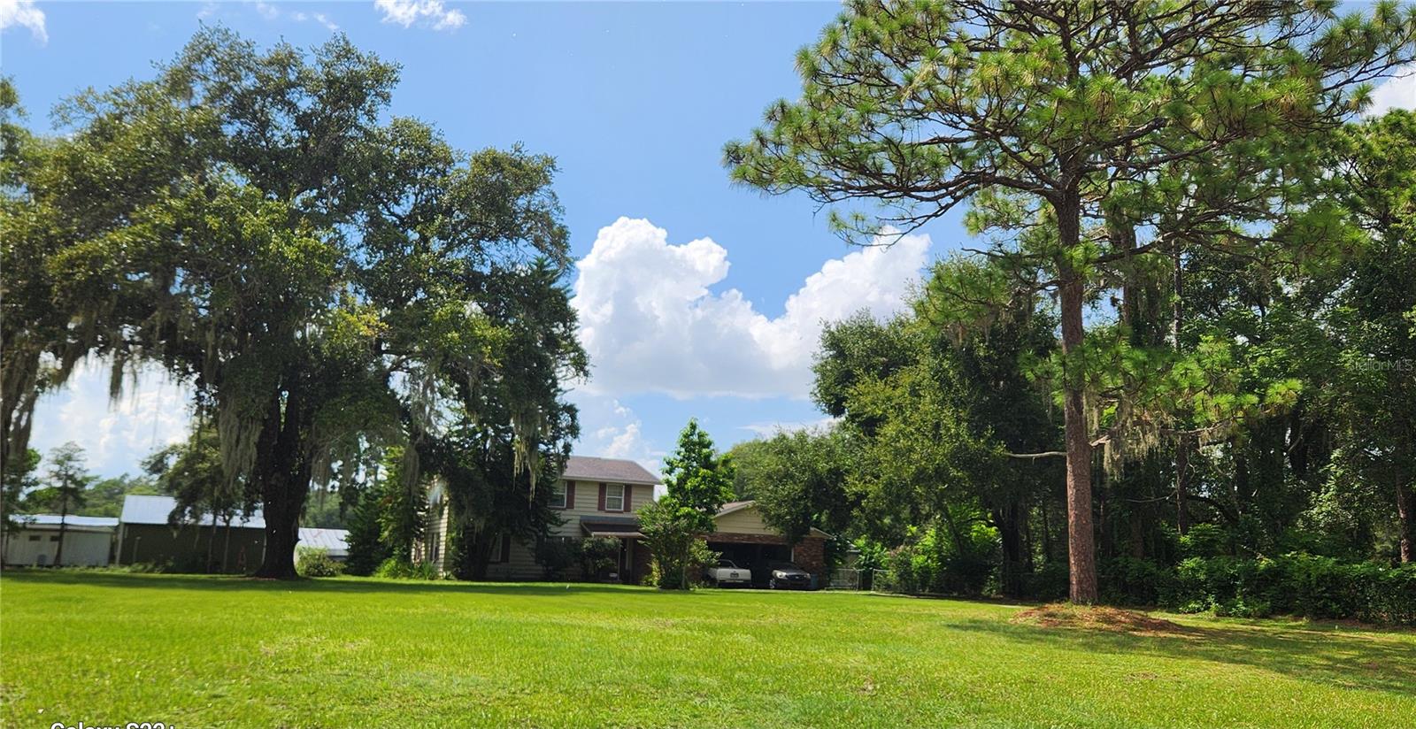 20-acre, 3 parcel package. Exceptional Development Opportunity for Investors, builders, or developers to create a custom community nestled among established upscale neighborhoods of Apopka Ranches with peaceful rural charm and convenient city access.

Discover endless potential with this beautiful 20-acre property located in the growing Apopka area. 
Whether you envision an upscale subdivision, a private equestrian estate, agricultural business or family compound, this property offers endless possibilities all in one of Central Florida's most desirable markets.

** 20+ acres. formerly used as a nursery and family compound.
** Ideal for residential development.
** Excellent access to major roadways, including SR 429 & SR 441.
** Near Apopka's growing residential and commercial corridor.
** Level, mostly cleared with some old growth trees at the North side of the lot.
** Prime investment opportunity in High growth area.

This property is comprised of 3 separate parcels. 

#1. 1048 Ustler Rd. (34-20-28-9550-00-120) APOPKA RANCHES Z/134 LOT 12 & 13. 
10.08 ACRES (+/-) Two story pool home with numerous outbuildings/barns/greenhouses.

#2. 1032 Ustler Rd. (34-20-28-9550-00-110) APOPKA RANCHES Z/134 LOT 11,
5.03 ACRES (+/-) 1 story home with numerous outbuilding/barns/greenhouses.
Adjacent to the beautiful neighborhood of WEKIVA PRESERVE.  

#3. 1114 Uster Rd. (34-20-28-9550-00-140) APOPKA RANCHES Z/134 LOT 14
5.05 ACRES (+/-) 1 story block home and outbuildings/ greenhouses.

Three-minute drive to Publix, Walgreens and Starbucks, 18-minute walk. 6 Minutes from Central Florida Equestrian Center. Property backs up to Orange County Clerk of Court with a nice, wooded buffer zone already in place. Small area of wetlands at the North side of property.