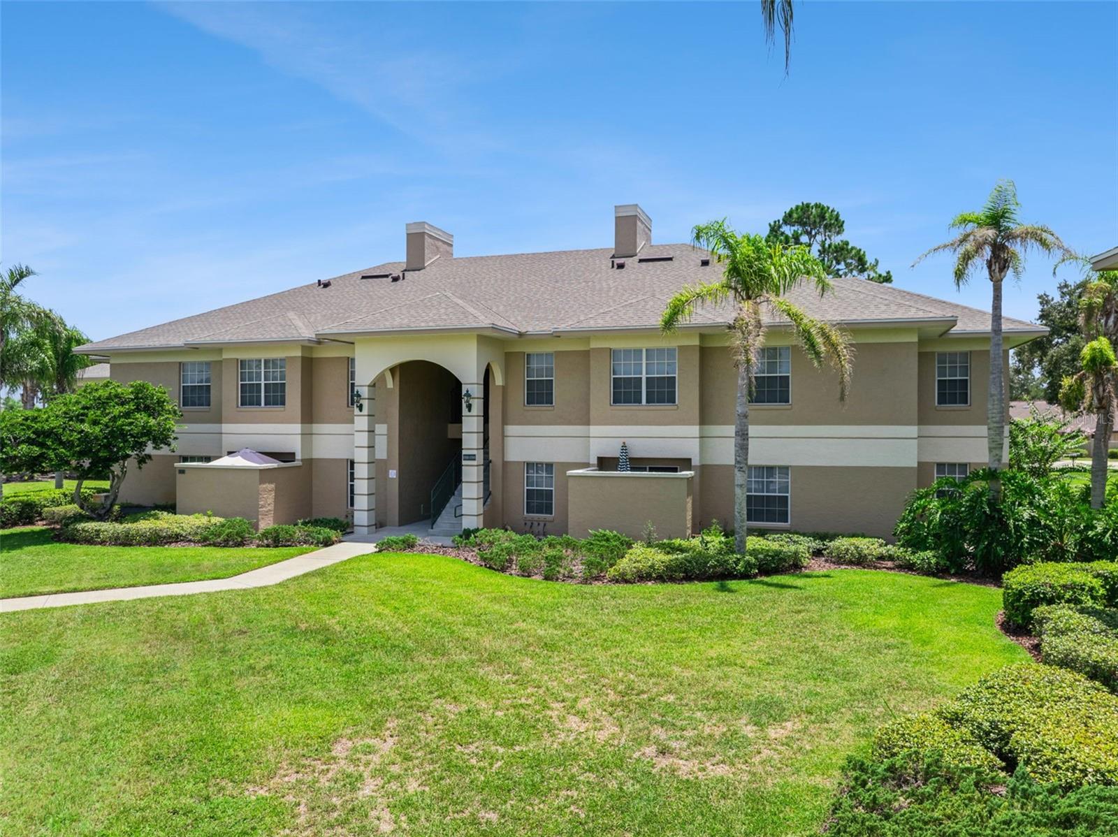 Don't miss the opportunity to own this lovely GROUND FLOOR Eagle Pond condominium in the highly sought-after gated community of Cypresswood Golf and Country Club that is PRICED TO SELL! Virtually maintenance-free Florida living doesn't get any better. Be greeted by 10-foot high ceilings, complimenting the open concept living area complete with expansive living and dining areas, including a kitchen breakfast bar. Walk-in closets in both bedrooms offer an abundance of space for organizing your belongings, and an en suite bathroom in the main bedroom for privacy and convenience. Enjoy the open-concept living area for entertaining friends and family and a private patio further compliment this delightful property. Immerse yourself in the outdoors on your private patio or take a walk, run, or bike ride to enjoy the natural scenery that abounds in this community. Cypresswood Golf and Country Club features a 24-hour manned guard gate, 18-hole championship golf course, junior Olympic-sized community pool, lighted tennis/pickleball/basketball courts, clubhouse, restaurant, pro-shop, event space, and so much more. The low monthly HOA fee includes all exterior and grounds maintenance, pest control, trash collection, and use of the pool and tennis amenities. Residents also enjoy a discount on daily golf and annual membership! Minutes from Highway 27 and the I-4 corridor, Winter Haven's very own Legoland Florida Resort, the Polk Parkway, and in the center of a thriving community with many convenient grocery, restaurant, shopping, and commuting options. Schedule your private showing today!