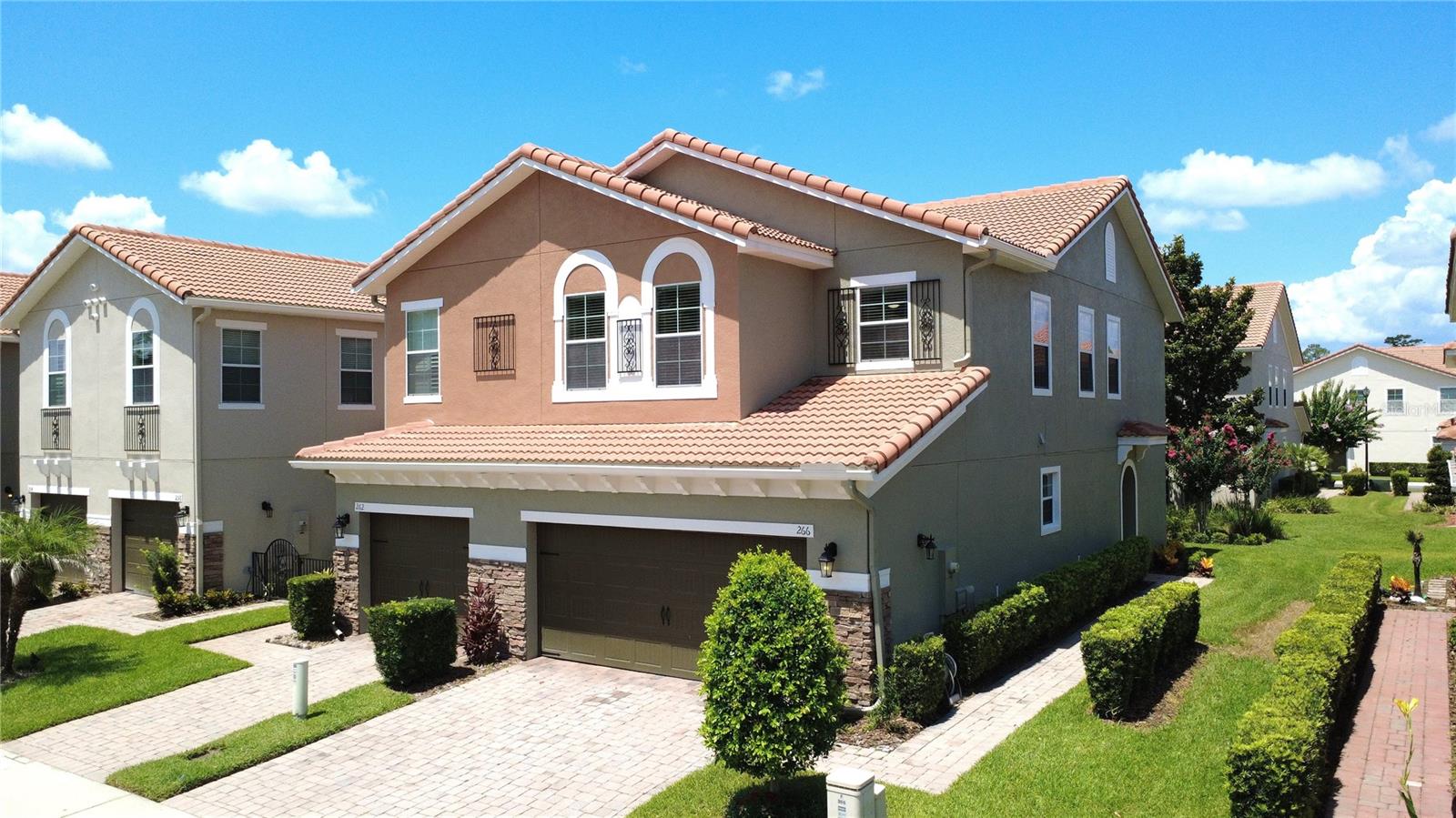 Your search is over! This stunning, move-in-ready end-unit townhome checks every box. Located in the highly sought-after gated community of Terracina at Lake Forest, this beautifully maintained home offers all the advantages of end-unit living, including additional windows that flood the interior with natural light, an open and airy feel throughout, and the added privacy of having only one shared wall. Combined with its exceptional location, this home offers the perfect blend of comfort, style, and convenience. Perfectly positioned just minutes from I-4 and SR 417, you'll enjoy effortless access to Lake Mary, downtown Orlando, major employment centers, both Orlando-area airports, and an incredible variety of shopping, restaurants, grocery stores, entertainment, and everyday conveniences. This move-in-ready home features three spacious bedrooms, two and a half bathrooms, and a two-car garage. A paver driveway and brick walkway create excellent curb appeal, while the covered front entry welcomes you inside. The bright, open floor plan is filled with natural light and showcases tile flooring, elegant crown molding, and spacious living and dining areas that are perfect for both everyday living and entertaining. Just off the living room is a charming enclosed patio, providing the perfect space to enjoy your morning coffee or relax after a long day. The well-appointed kitchen features granite countertops, rich wood cabinetry, a pantry, and ample counter space, making it both functional and inviting. Upstairs, the spacious primary suite offers laminate flooring, a large walk-in closet, and an ensuite bath complete with dual vanities, a soaking tub, and a separate walk-in shower. Two additional bedrooms provide plenty of space for family, guests, or a home office. Residents of Terracina at Lake Forest enjoy a gated, low-maintenance lifestyle with beautifully maintained grounds, a community pool, and cabana. Outdoor enthusiasts will appreciate being just minutes from the Central Florida Zoo & Botanical Gardens, while commuters will love the easy access to I-4 and SR 417. The home is also conveniently located near the shopping, dining, and entertainment of Lake Mary, with world-famous attractions including Walt Disney World, Universal Orlando Resort, SeaWorld Orlando, and the beaches of New Smyrna Beach and Daytona Beach all within an easy drive. Whether you're commuting to work, enjoying a night out in Lake Mary, or spending the weekend exploring everything Central Florida has to offer, this exceptional home offers the perfect combination of comfort, convenience, and location in one of Seminole County's most desirable gated communities. Schedule your private showing today!