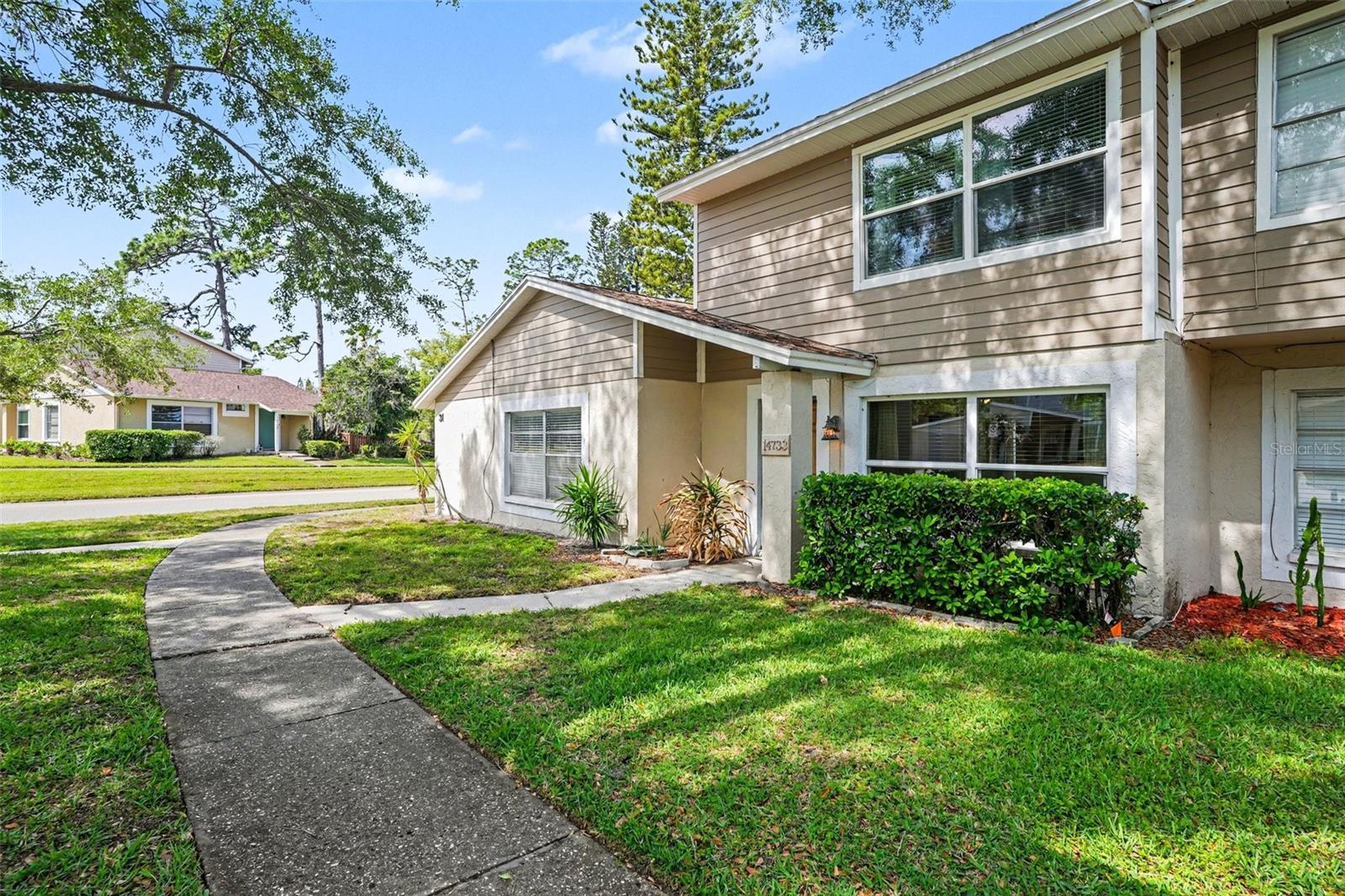 Discover a rare opportunity in the highly sought-after Lake Forest community in Lutz! This beautifully updated 2-bedroom, 2-bathroom townhome offers the perfect blend of comfort, style, and lifestyle. AC 2020 and Water Heater 2023. 
Step inside to find fresh new paint, modern updates, and upgraded flooring that create a clean, move-in-ready feel throughout. The spacious layout provides flexibility and privacy, with two generously sized bedrooms and two bathrooms—and spacious indoor washer and dryer closet.  
Out back, unwind in your own tropical retreat. The lush, private backyard is perfect for relaxing evenings, entertaining guests, or simply enjoying Florida living at its finest.
Lake Forest is known for its incredible amenities, including tennis courts, pools, scenic parks, and expansive green spaces. Take peaceful evening strolls along the lake, enjoy the vibrant community atmosphere, and experience a lifestyle that truly feels like a getaway every day.
Properties like this don’t come up often in this community—especially with this level of updates. Don’t miss your chance to call this exceptional townhome your own—schedule your showing before it’s gone!