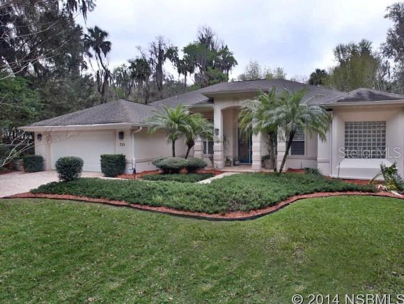 1.6 ACRE POOL HOME ON HIGHLY SOUGHT AFTER TIMBERLANE DR! Down this unassuming side street, under a canopy of towering oaks and tendrils of Spanish moss sits a spacious 3 bed / 3 bath pool home, tucked away on over an acre and a half, under ancient oaks arching the driveway. This home features: 12 ft ceilings, a formal sitting room, formal dining room, pool bath w/ shower, and an executive-style office. In the family room, youâll find a massive picture window looking out into the trees. Just beneath the window, youâll find the fireplace, punctuating this very welcoming space to wile away the time with friends & loved ones. Gourmet kitchen boasts custom cut granite counters, prep island, pendant lighting, gas stove, and all new stainless appliances. Large master suite features tray ceiling detail, walk-in closets, double vanity sinks, huge glassed-in shower & a jetted garden tub. The screened-in pool & spa are salt water as well as heated. The backyard is a plethora of Old Florida growth, featuring landscape lighting, mature magnolia trees & an impressive cluster of bamboo, plus there are also 7 raised garden boxes with irrigation in place perfect for a veggie or herb garden. This home has it all: the natural beauty of Old Florida, the privacy of respite, and the space to grow, all within the city limits and just minutes to the beach. ;Water: City