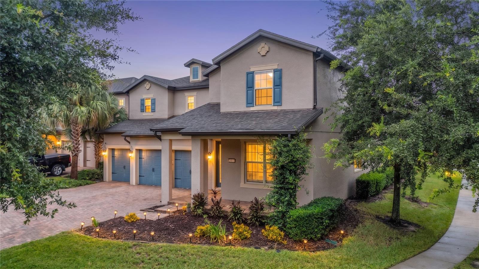 WELCOME TO LAKEVIEW POINTE AT HORIZON WEST! This 5-bedroom, 4-full-bath Pulte Creekview floorplan offers a flexible two-story layout with a downstairs primary suite, upstairs loft, flex room, 3-car garage, and a fully fenced corner-lot backyard. Hardwood flooring extends throughout the first floor, complemented by tray ceilings in the foyer and primary suite, plantation shutters, neutral interior paint, and updated lighting in the flex space and breakfast nook. The open kitchen, café, and family room create a central gathering space, featuring 42-inch maple cabinetry with crown molding and hardware, granite countertops, an oversized island with breakfast bar seating, built-in wall oven and microwave, corner walk-in pantry, and extended cabinetry along the breakfast nook for additional storage. Glass sliders with a remote-controlled window treatment open to the covered, extended screened brick-paver patio overlooking the private fenced yard. The downstairs primary suite includes a tray ceiling, oversized walk-in closet, dual-sink granite vanity, glass-enclosed tiled walk-in shower, and private water closet. Three additional bedrooms are located downstairs, including one adjacent to a full bath with dual-sink granite vanity, while two bedrooms share another full bath. Upstairs, a loft, storage room, fifth bedroom with extensive closet space, and a fourth full bath provide versatile space for guests, work, hobbies, or media use. Recent improvements include interior and exterior paint, two new AC systems installed in 2025, ceiling fans, bathroom mirrors, front door hardware, epoxy-finished garage floor, and overhead garage storage racks. Kitchen appliances, washer, and dryer convey. A transferable Choice Home Warranty is included through May 2027, subject to warranty terms. Lakeview Pointe HOA includes lawn care, irrigation, community pool, fitness center, playground, and additional community amenities. Convenient Horizon West location near Hamlin shopping and dining, SR-429, Winter Garden Village, Walt Disney World Resort, and major Central Florida attractions.