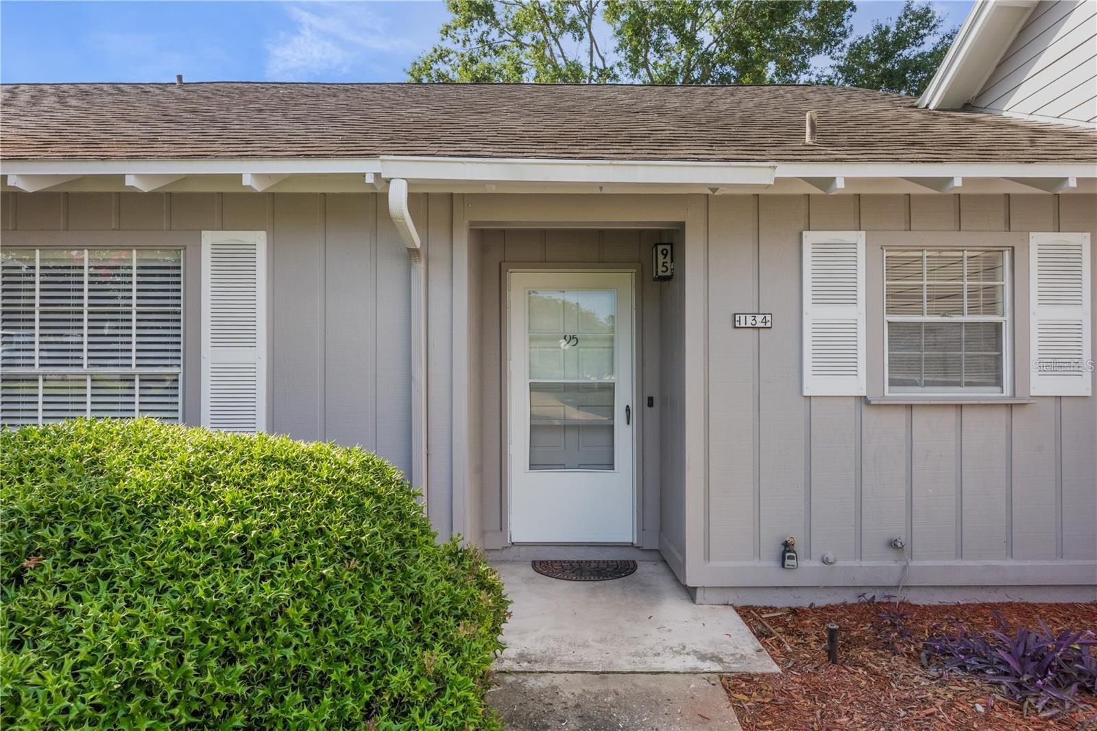 Enjoy easy Florida living in this beautifully maintained 2-bedroom, 2-bathroom villa located in the desirable Errol Estate community. Designed for both comfort and convenience, the home features a light-filled open layout with vaulted ceilings and spacious bedrooms—each with its own private bath. Unwind on your screened-in patio while taking in the peaceful, nature-filled surroundings near Lake Alden. With exterior maintenance, lawn care, and pest control included through the condo association, this home offers a relaxed, low-maintenance lifestyle in a serene setting.