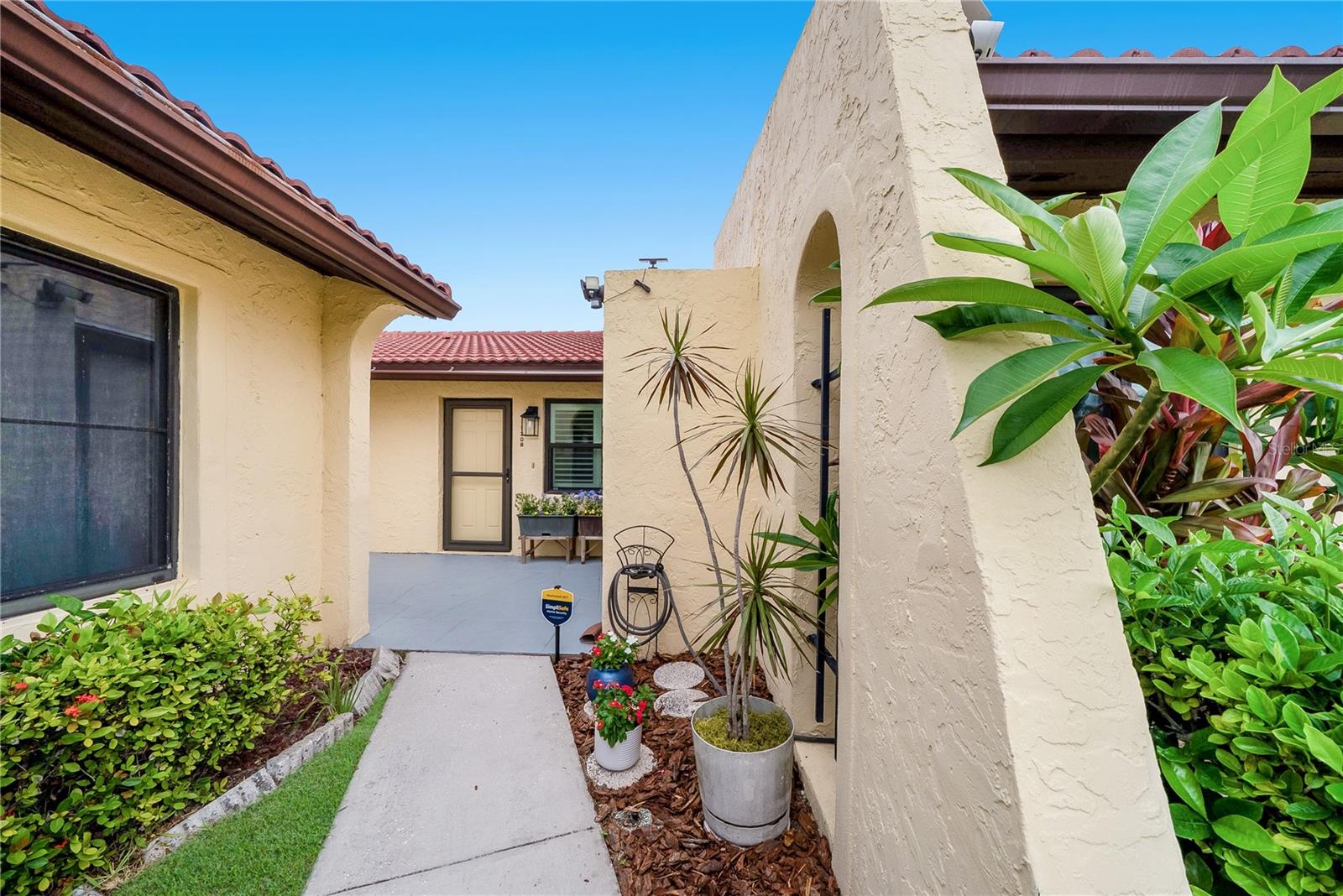 Welcome to the vibrant community of Meadowcroft, one of West Bradenton’s most sought-after 55+ communities, where an active lifestyle and a strong sense of community come together. Embrace a laid-back coastal lifestyle in this updated and airy, sunlit condo with a fresh and welcoming aesthetic. This 1-bedroom, 1-bath villa in the enclave of Meadowcroft is just minutes from the pristine beaches, turquoise waters, and island charm of Anna Maria Island. Offering exceptional flexibility, this residence provides versatile appeal as a seasonal getaway, full-time residence, or income-producing investment property. Thoughtfully upgraded from top to bottom, this move-in-ready condo showcases the seller’s commitment to quality and comfort. Enjoy peace of mind with impact-resistant windows throughout, a new front door and storm door, tankless water heater, and a 2019 HVAC system with an active maintenance service contract. Elegant Hunter Douglas plantation shutters add timeless coastal style, while updated recessed lighting with voice control capability create a bright and welcoming atmosphere. An internet-connected programmable thermostat allows for effortless climate control whether you’re at home or away. The well-appointed kitchen features new appliances, including a refrigerator, stove, dishwasher, and garbage disposal, while the new Bosch stackable washer and dryer provide added convenience. The bathroom and flooring have been tastefully updated, enhancing the overall warmth and style. For added confidence, the owner added a new lanai roof in 2025. Perfectly positioned near Gulf Coast beaches, Sarasota and Tampa international airports, downtown Sarasota with world-class dining/shopping and a lively arts and culture scene, premier medical facilities, and everyday conveniences. This low-maintenance retreat offers the flexibility today’s buyers desire. Residents enjoy an impressive array of amenities, including a heated swimming pool, clubhouse, pickleball/tennis courts, shuffleboard, and a vibrant social calendar designed to keep you engaged year-round. Enjoy worry-free living with a value-packed HOA that covers cable, internet, water, sewer, trash, access to community amenities, and comprehensive exterior maintenance—including the roof. Just  a short drive healthcare, and everyday conveniences, this location offers the ideal blend of relaxation and accessibility. Whether you're seeking a seasonal escape, a downsizing opportunity for a low-maintenance primary residence or seeking a smart investment in Florida living, this coastal gem is ready to impress. This charming condominium delivers exceptional value and an outstanding lifestyle. Don't miss your opportunity to own a piece of paradise—schedule your private showing today!