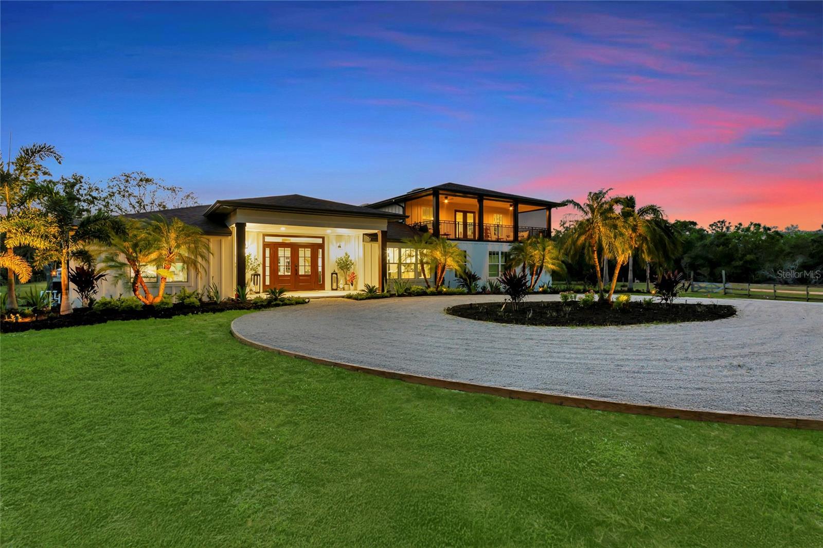 COUNTRYSIDE LIVING WITH MODERN LUXURY This stunning 4-bedroom, 3-bathroom home, ADU ready sitting gracefully on a generous 5-acre lot, offering the perfect blend of privacy and comfort. Newly remodeled with meticulous attention to detail, this 3,800 square foot residence features an innovative layout with complete first-floor living and an independent second-floor in-law suite that includes its own primary bedroom, bathroom, living room, kitchenette and private oversized screened-in balcony. The open floor plan creates an airy, welcoming atmosphere throughout. The gourmet kitchen boasts Kitchen-Aid appliances and custom cabinetry that would make any home chef smile. High-end Moen fixtures add a touch of elegance in all bathrooms, which have been completely renovated. New French doors showcase breathtaking views and open to reveal your personal oasis – a spectacular backyard featuring a serene pond and unforgettable sunset vistas. Enjoy the Florida lifestyle from your screened lanai and pool area. The oversized saltwater heated pool has been renovated with new finishing and tile as well as all new equipment. Practical luxury continues with new PGT impact windows, new roof, new HVAC systems, fresh new tile throughout, generous walk-in custom closets, and an oversized garage with ample storage space which has also been totally renovated. Complete with an underground propane tank and a full house generator. There is nothing this home is missing but you! Nature lovers will appreciate the tranquil environment where you can truly escape the hustle and bustle. And yes, horse enthusiasts – equine friends are welcome here! Nearby attractions include Waterside, The Out-of-Door Academy, parks including the picturesque Boat House at Lakehouse Cove, and convenient shopping all just a short drive away. This isn't just a house – it's a retreat where memories will be made for years to come!