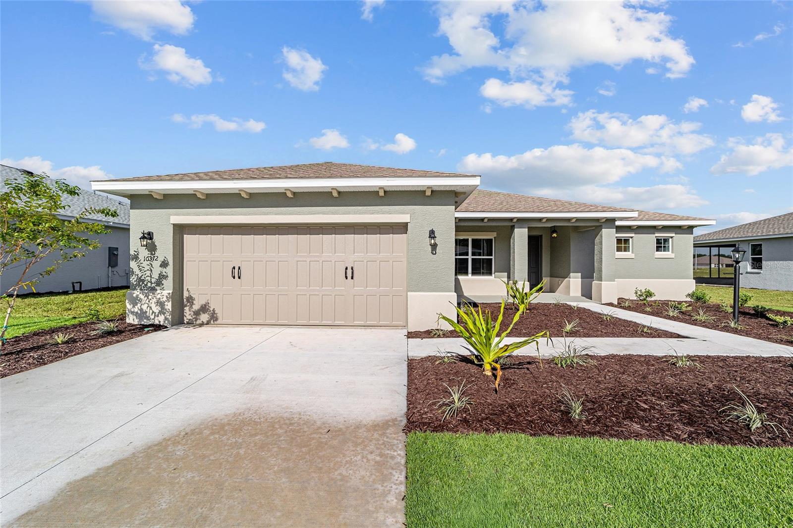 Unfurnished Lease-to-Own home available in the Longleaf Ridge neighborhood of On Top of the World, Ocala's premier 55+ active adult community! Welcome to the Livingston Model, a beautifully designed new construction home offering 2 bedrooms, 2 bathrooms, an oversized 2-car garage with separate golf cart parking, and a versatile flex space perfect for a home office, den, or hobby room. Tile flooring flows throughout the home, providing both elegance and easy maintenance. The gourmet kitchen is the centerpiece of the home, featuring stainless steel appliances, rich brown cabinetry with crown molding, quartz countertops, a stylish backsplash, under-cabinet lighting, a pantry, and a large center island ideal for entertaining and everyday living. The dining area, accented by a chandelier and backyard views, opens seamlessly to the spacious living room, where a 3-panel sliding glass door leads to the screened lanai for effortless indoor-outdoor living. The primary suite offers a peaceful retreat with backyard views, a large walk-in closet, and a luxurious en suite bath featuring dual quartz vanities, tile flooring, and a zero-entry tiled shower with a built-in bench. The guest bedroom is conveniently located near the full guest bath with a quartz vanity and tiled tub/shower combination. Residents enjoy access to resort-style amenities, golf courses, fitness centers, recreation facilities, clubs, and activities in a gated, golf cart-friendly community. Pet friendly. Rent is $2,500 per month plus utilities. Minimum lease term is 3 years with the option to purchase the home during the lease term. Property ID: 154LLR7.