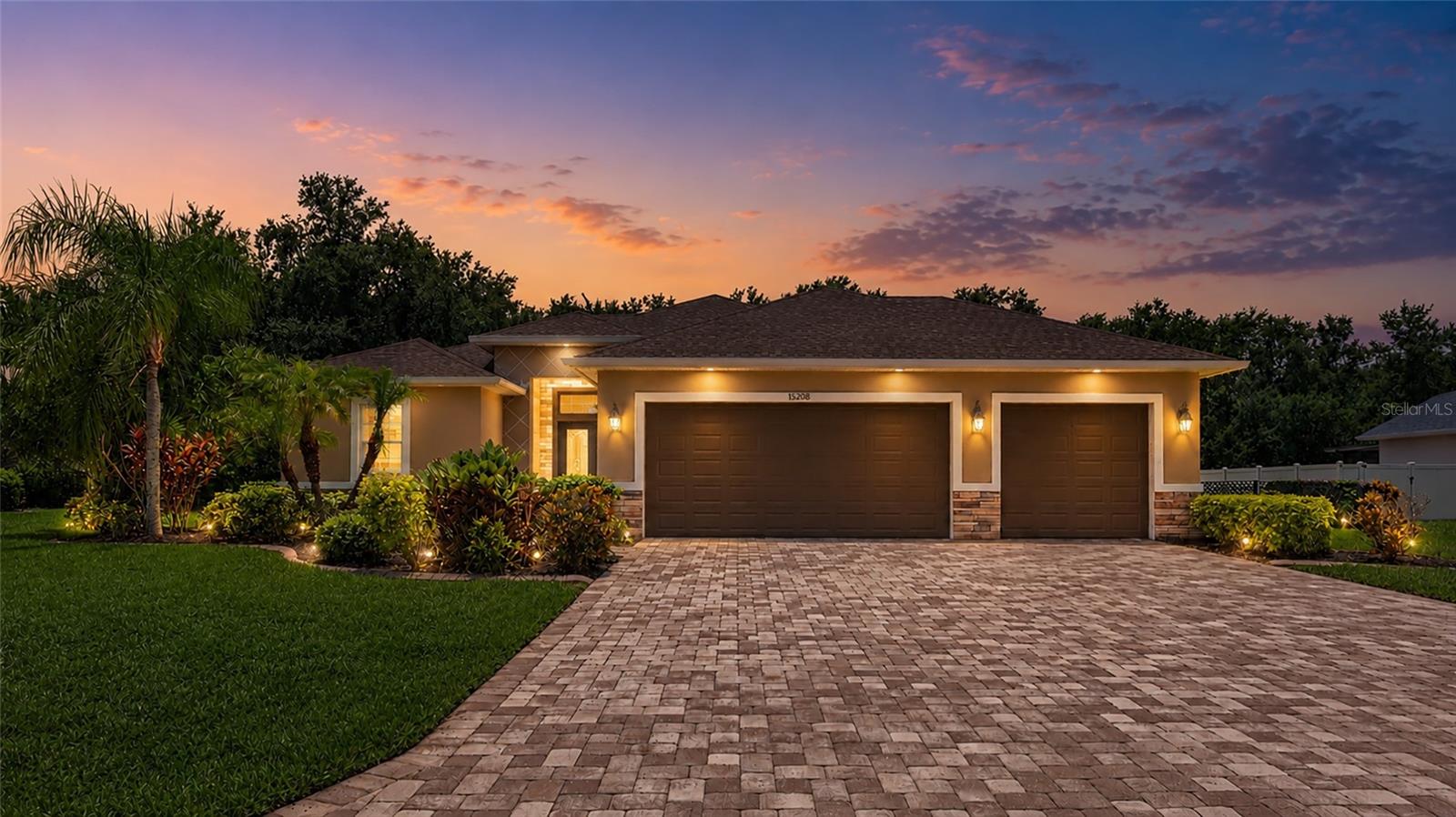 If you've been looking for something beyond the typical production home, this custom-built Johnson Home in Mill Creek may be exactly what you've been waiting for. Situated on more than a half-acre with a fully fenced backyard, this pool home offers the space, quality, and privacy that are becoming increasingly difficult to find.

Known for superior craftsmanship and thoughtful design, Johnson Homes built this residence with features often overlooked in larger tract-built homes. Mill Creek continues to be one of East Manatee County's most desirable communities, offering oversized homesites, low HOA fees, no CDD fees, and an outstanding location just minutes from Lakewood Ranch, top-rated schools, shopping, dining, and everyday conveniences.

From the moment you arrive, the mature landscaping, oversized driveway, and double-door entry create a welcoming first impression. Inside, the open great room floor plan is designed for comfortable everyday living and entertaining. The kitchen features granite countertops, premium wood cabinetry, stainless steel appliances, including a double wall oven, generous counter space, and a large breakfast bar overlooking the great room. Sliding glass doors open to the screened pool and lanai, while tray ceilings and crown molding add custom architectural detail throughout the main living areas.

The spacious primary suite offers a large walk-in closet with custom built-ins. The primary bathroom includes dual vanities, a walk-in shower, a soaking tub, and solid surface countertops. The guest bedrooms are generously sized, and the home provides abundant storage throughout.

Step outside to your private screened pool and lanai overlooking the fully fenced backyard, providing plenty of room for children, pets, gardening, or simply enjoying your own private outdoor retreat.

Be sure to click the Virtual Tour link to experience the interactive 3D tour and walk through the home from anywhere.