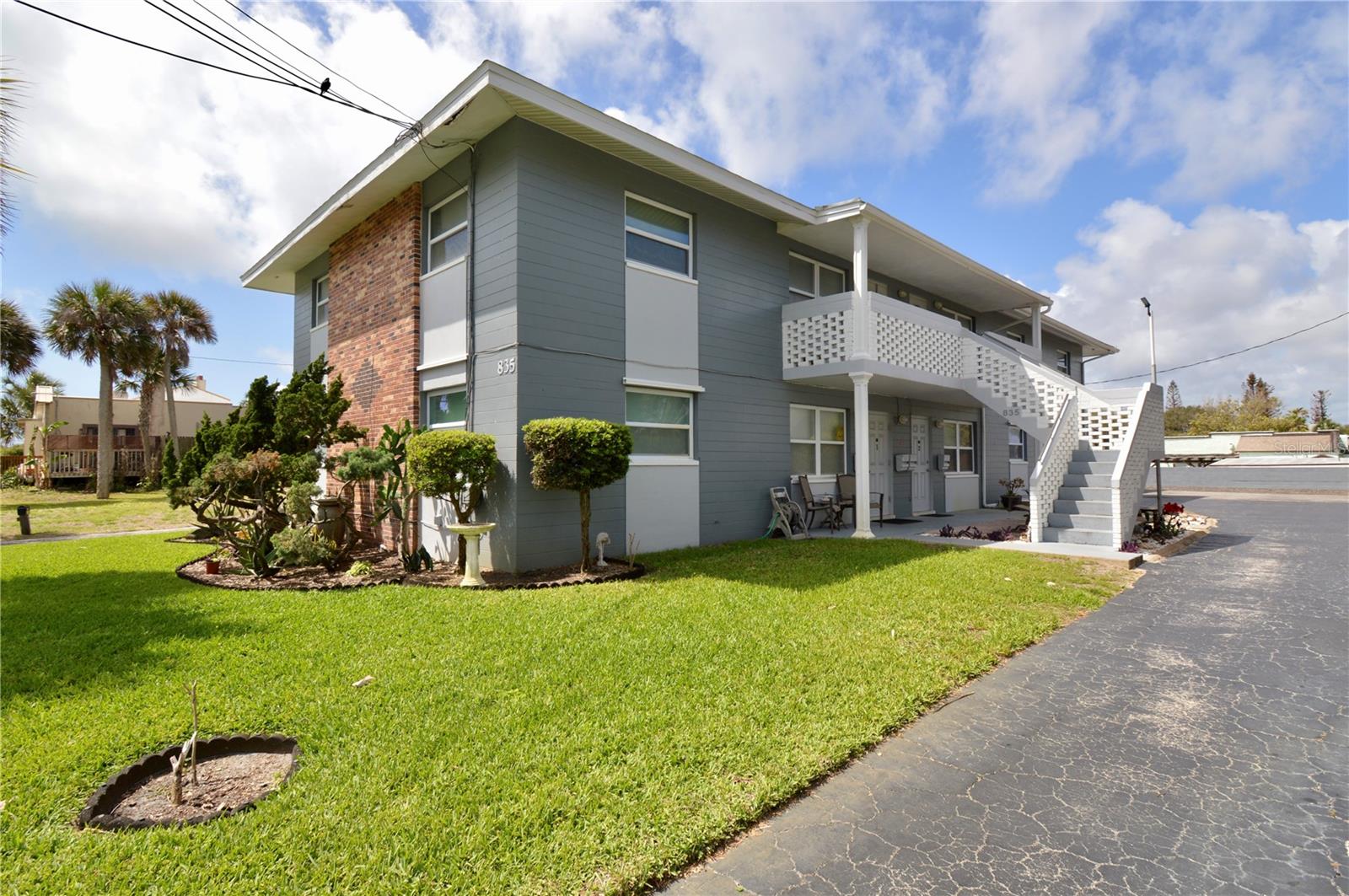 Rare opportunity to own a solid concrete block 4-plex just minutes from the beach and the Hard Rock Hotel — fully occupied and generating $5,050/month in rental income. Built in 1968 with the durability that only CBS construction delivers, this well-maintained property features one spacious 3BD/2BA unit and three 2BD/1BA units, each with two private entries and its own locked storage unit.
All leases are month-to-month with rents currently below market, giving a new owner immediate upside potential. Upper units enjoy private balcony areas, and Unit 3 offers a peek-a-boo ocean view. Additional income streams include an on-site coin laundry (~$200–$300/mo), a rentable one-car garage, and two covered parking spaces.
Recent upgrades include 2020 impact windows, storm shutters, new copper A/C refrigerant lines, a new retaining wall, and an irrigation well. Unit 4 (3/2) is fully renovated with all-new vinyl plank flooring and new bathrooms. Units 1 and 2 feature beautiful, durable terrazzo floors.
Ideal for the investor seeking immediate cash flow with room to grow, or the savvy buyer who wants to live in the updated 3/2 unit while three rentals help cover the mortgage. Private storage for every tenant, coin laundry on-site, and a coastal location that keeps demand strong year-round. Don't miss this one.