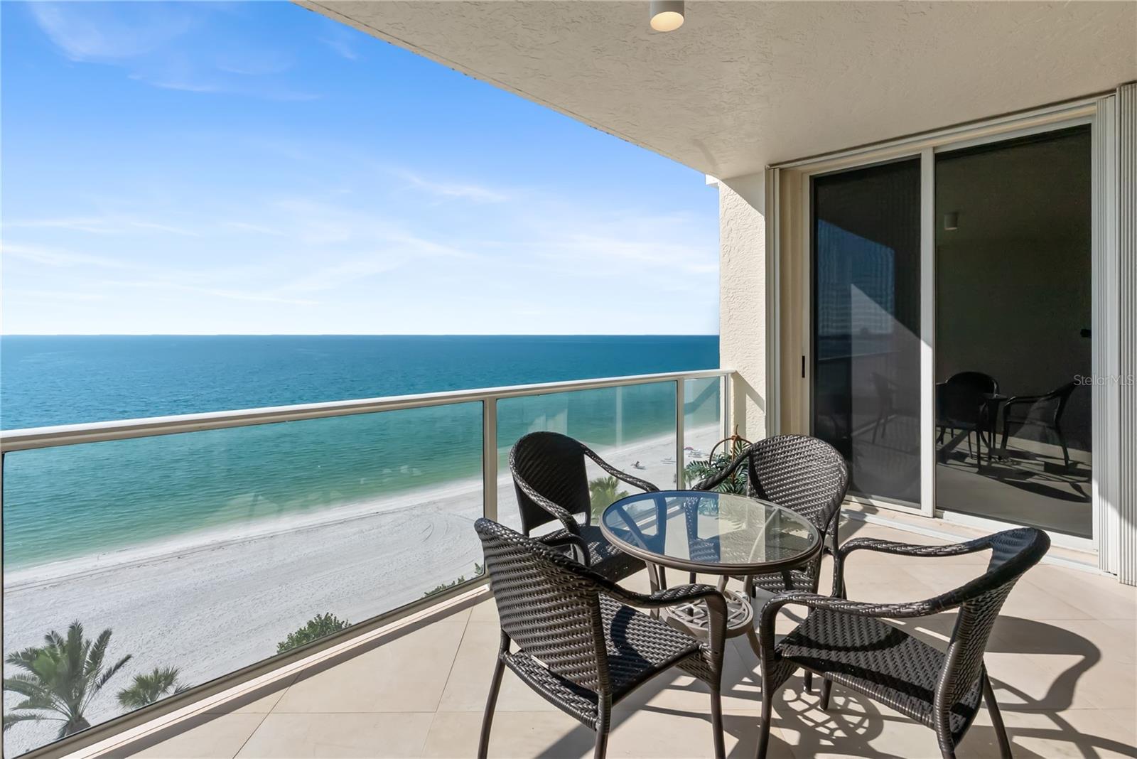 Experience luxury coastal living at its finest in this completely renovated 2-bedroom, 2.5-bath residence with an additional office at L’Elegance on Lido Beach. Perched on the 8th floor, this stunning condominium offers both Gulf and Sarasota Bay views from multiple balconies, delivering an ever-changing backdrop of sunsets, sailboats, and shimmering water.

Step inside to an expansive, light-filled layout redesigned with modern living in mind. The newly enlarged kitchen features a wrap-around solid-surface counter-height bar—perfect for casual dining or entertaining—along with premium cabinetry, updated appliances, and dual beverage refrigerators. An expanded doorway to the office enhances the open feel of the home and was thoughtfully designed to capture even more of the breathtaking water views, whether you’re working or relaxing.

The spacious primary suite offers a true retreat with a large walk-in closet and elegantly updated bath. A second ensuite bedroom ensures comfort and privacy for guests. Additional conveniences include an in-unit stacked washer and dryer, ample storage, and storm shutters for peace of mind.

Located in the prestigious, gated L’Elegance community, residents enjoy resort-style amenities on one of Florida’s most coveted beachfronts. This fully renovated, view-rich residence combines contemporary sophistication with effortless coastal living—an exceptional opportunity on Lido Key