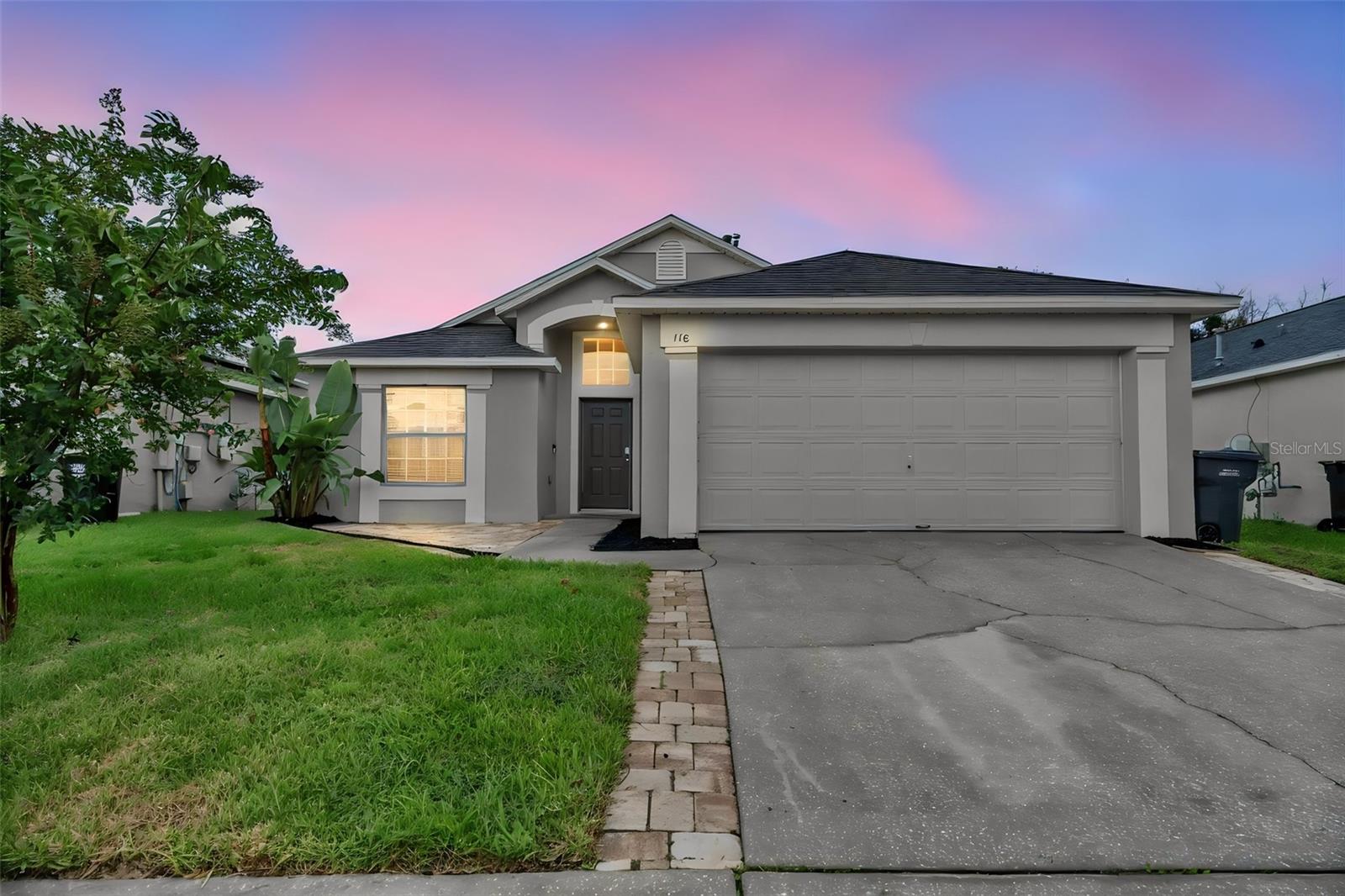 MOVE-IN READY with extensive recent improvements, this well-maintained 3-bedroom, 2-bath home offers 1,582 square feet of thoughtfully designed living space, an attached two-car garage, and a FULLY FENCED BACKYARD in Seybold on Dunson Road. Major updates include a NEW HVAC SYSTEM with furnace and A/C in 2026, NEW SOD AND IRRIGATION SYSTEM in 2025, and a NEW ROOF with a complete tear-off, TANKLESS WATER HEATER, and freshly painted exterior completed in 2024.

Step through the front entrance into a bright, open living area where vaulted ceilings, recessed lighting, and abundant natural light create an inviting sense of space. Luxury vinyl plank flooring flows throughout the main living areas and bedrooms, creating a cohesive look with durability and easy maintenance. The living room connects naturally to the dining area and kitchen, providing a comfortable layout for everyday living and entertaining.

The dining area is surrounded by multiple windows that fill the space with natural light and provide room for a full-size dining table. The adjoining kitchen offers generous cabinetry, ample countertop space, pantry storage, a double-basin sink, and a full appliance package that includes a refrigerator, gas range, microwave, and dishwasher. Its open connection to the living and dining areas allows conversation and activity to flow easily throughout the center of the home.

The spacious primary suite features vaulted ceilings, luxury vinyl plank flooring, room for a complete bedroom set, and an oversized walk-in closet with built-in shelving. The private en-suite bathroom includes a walk-in shower, a relaxing garden tub, and a window that brings in natural light. Two additional bedrooms provide flexibility for family, guests, hobbies, or a home office and share a conveniently located second full bathroom.

Sliding glass doors open from the living area to the backyard patio, extending the home’s usable living space outdoors. The FULLY FENCED BACKYARD offers privacy, a refreshed lawn supported by the newer irrigation system, and room for outdoor dining, grilling, gardening, or recreation. A landscaped planting bed adds definition along the rear fence while leaving ample open space to enjoy.

Additional conveniences include an interior laundry area, washer and dryer that remain with the home, ample closet storage, an attached two-car garage, and a practical single-story floor plan. The property sits on an approximately 5,249-square-foot lot and is located in Flood Zone X.

Situated in the Davenport area, the home provides convenient access to shopping, dining, schools, major roadways, and Central Florida destinations. Its location offers an easy connection to ChampionsGate, Interstate 4, and the greater Orlando region while maintaining a comfortable residential setting.

With major systems already updated, a functional open layout, generous storage, and a private fenced backyard, this home is prepared for its next owner. Contact us today for a private tour or more details on this exceptional opportunity.