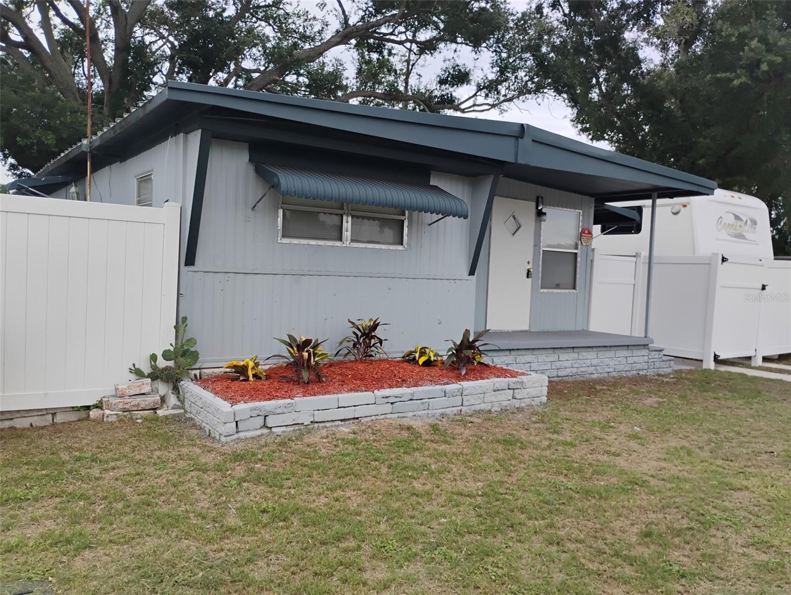 Cash or hard money.  Financing available with down payment. Serious inquiries only.

Why rent when you can own, Newly updated 3/2 home on an oversized lot with no HOA and no land lease—you own the land with no restrictions! NO FLOOD ZONE!
This unique income-producing property features a separate mother-in-law suite with its own entrance, making it ideal for long-term or short-term rental opportunities. Recent updates include a new kitchen, remodeled bathrooms, new doors and windows, updated flooring, fresh interior paint with knockdown texture, upgraded electrical system, newer appliances, water heater, private vinyl fencing, inspected drain field, and mini-split A/C system.
The spacious lot offers ample parking and room for family gatherings. The property also includes a fully functional fifth-wheel RV with electric, water, and sewer connections already in place. The RV is set up as a comfortable living space comparable to a one-bedroom apartment, making it perfect for snowbirds, guests, or additional rental income.
Live in one unit and rent the other two, or maximize income by renting all three living spaces. Potential rental income of approximately $3,000 monthly.
Schedule your showing today and discover the income potential and flexibility this unique property has to offer!