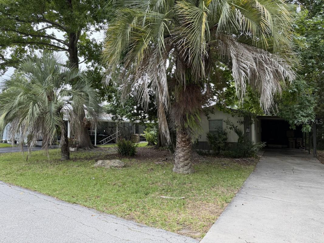 2BD/1.5BA single-wide mobile home in a desirable 55+ community where residents own their land. Features include city water/sewer, backyard porch, carport, concrete driveway, and low $65/month HOA. Community amenities include a pool, clubhouse, shuffleboard, and picnic area. Convenient location near shopping and everyday conveniences.
Property has smoke damage from a small fire caused when intruders set a DVD collection on fire. The fire was contained and did not spread through the structure. Great value-add opportunity.