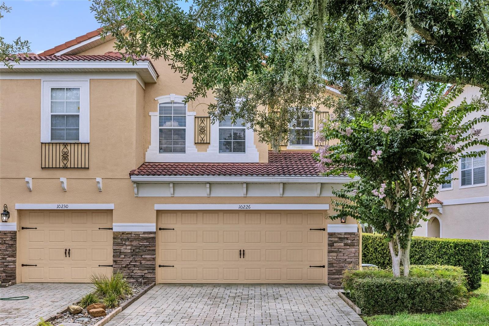 Experience resort-style living in this exclusive community of just 54 townhomes, ideally located adjacent to Disney! This move-in-ready, upgraded townhome features 3 bedrooms, 2.5 bathrooms, and a 2-car garage in one of the area's most sought-after locations. Enjoy breathtaking nightly views of the Magic Kingdom fireworks, along with stunning vistas of the 100-acre South Lake, the Grand Cypress Golf Course, and surrounding conservation areas. Residents have access to a charming lakeside clubhouse complete with a sun deck, perfect for fishing, relaxing, and enjoying the scenery. Situated within a top-rated school district and conveniently close to premier shopping, dining, and entertainment destinations. Don't miss this incredible opportunity—schedule your private showing today!