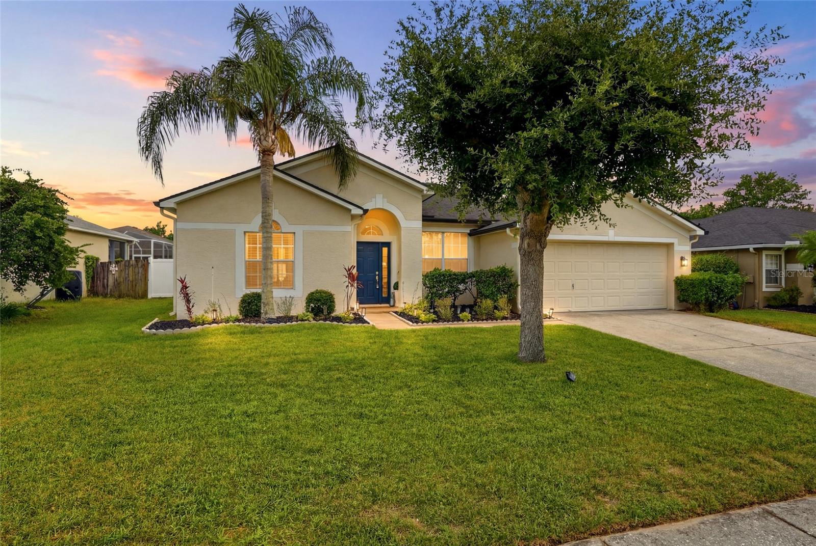 Welcome to Wyndham Lakes, where thoughtful updates, a functional single-story layout, and an exceptional Odessa location come together to create the perfect place to call home. Situated on a spacious 8,475 square foot lot within the highly sought-after Steinbrenner High School district, this move-in ready 3-bedroom, 2-bathroom home offers 1,920 square feet of living space, a 2-car garage, and extensive updates throughout.

Built with concrete block construction on a concrete slab and featuring a hip roof, this home offers durability, energy efficiency, and insurance advantages buyers appreciate. Major mechanical updates have already been completed, including a new roof (2023), HVAC system (2021), water heater (2026), and rain gutters (2023). Located in Flood Zone X, flood insurance is not required. Current homeowner's insurance is approximately $2,200 annually.

Inside, soaring 9'4" ceilings and abundant natural light create an open and inviting atmosphere. The desirable split-bedroom floor plan features formal living and dining rooms at the front of the home and an open-concept kitchen, breakfast nook, and family room at the rear. Recent interior improvements include luxury vinyl plank flooring throughout the main living areas, kitchen, bathrooms, and laundry room, new carpet in all bedrooms and closets, fresh interior paint, updated lighting fixtures, recessed LED kitchen lighting, ceiling fans, new countertops, updated cabinet hardware, and new toilets in both bathrooms.

The spacious kitchen overlooks the family room and breakfast area, making everyday living and entertaining effortless. Additional upgrades include a new refrigerator, dishwasher, washer, dryer, and range.

The private primary suite serves as a true retreat with sliding glass doors leading to the screened lanai, dual walk-in closets, dual vanities, a large walk-in shower, garden tub, and private water closet. One secondary bedroom also features a walk-in closet, while the guest bathroom includes a shower/tub combination ideal for families and pet owners.

Outdoor living is equally impressive with a screened lanai measuring over 23 feet in length overlooking the fully fenced backyard. The expansive yard provides plenty of room for a future swimming pool while still offering space for pets, play, and outdoor entertaining. Recent exterior improvements include professional landscaping, landscape lighting, flower beds, trees, and a new 6-foot vinyl privacy fence.

Residents of Wyndham Lakes enjoy a community playground and low HOA fees of just $450 annually. Conveniently located near shopping, dining, medical facilities, and major commuter routes, the property is also approximately 15 minutes from Carrollwood Country Club and within easy reach of multiple YMCA locations.

Move-in ready homes with major system updates, a large, fenced backyard, low HOA fees, Flood Zone X designation, and access to the Steinbrenner High School district are becoming increasingly difficult to find. Don't miss this exceptional opportunity to enjoy the best of Odessa living.

AGE OF MAJOR MECHANINCS - Roof - 2023, HVAC - 2021, Water Heater - 2026