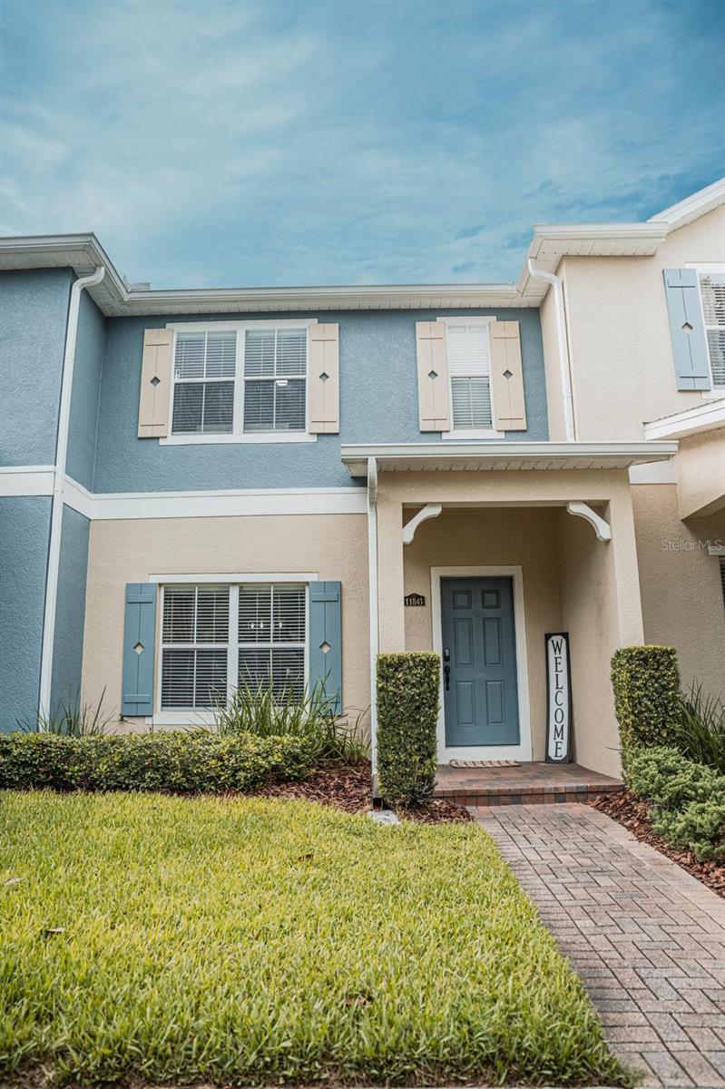 Seller is willing to contribute to closing costs!. Welcome to this beautifully updated 2-bedroom, 2.5-bath townhome located in the desirable Moss Park/Lake Nona area, just minutes from Medical City, Orlando International Airport, SR-417, shopping, dining, and everyday conveniences.

This move-in-ready home features an open-concept layout with laminate wood flooring throughout, elegant hardwood stair treads, and a spacious kitchen that flows seamlessly into the living and dining areas. Upstairs, you'll find two generously sized bedrooms, each offering comfort and privacy.

Recent upgrades include a new roof (2023), a new garage door opener (2025), fresh exterior paint (2026), a beautifully updated primary bathroom with a quartz vanity, and a refreshed half bath with modern finishes.

Enjoy a low-maintenance lifestyle with community amenities including a resort-style swimming pool, playground, walking paths, and green spaces. Conveniently located approximately 30 minutes from Walt Disney World and close to Lake Nona Town Center, USTA National Campus, and Orlando's premier employment and entertainment destinations.

Don't miss this exceptional opportunity to own a beautifully updated home in one of Central Florida's fastest-growing communities.
